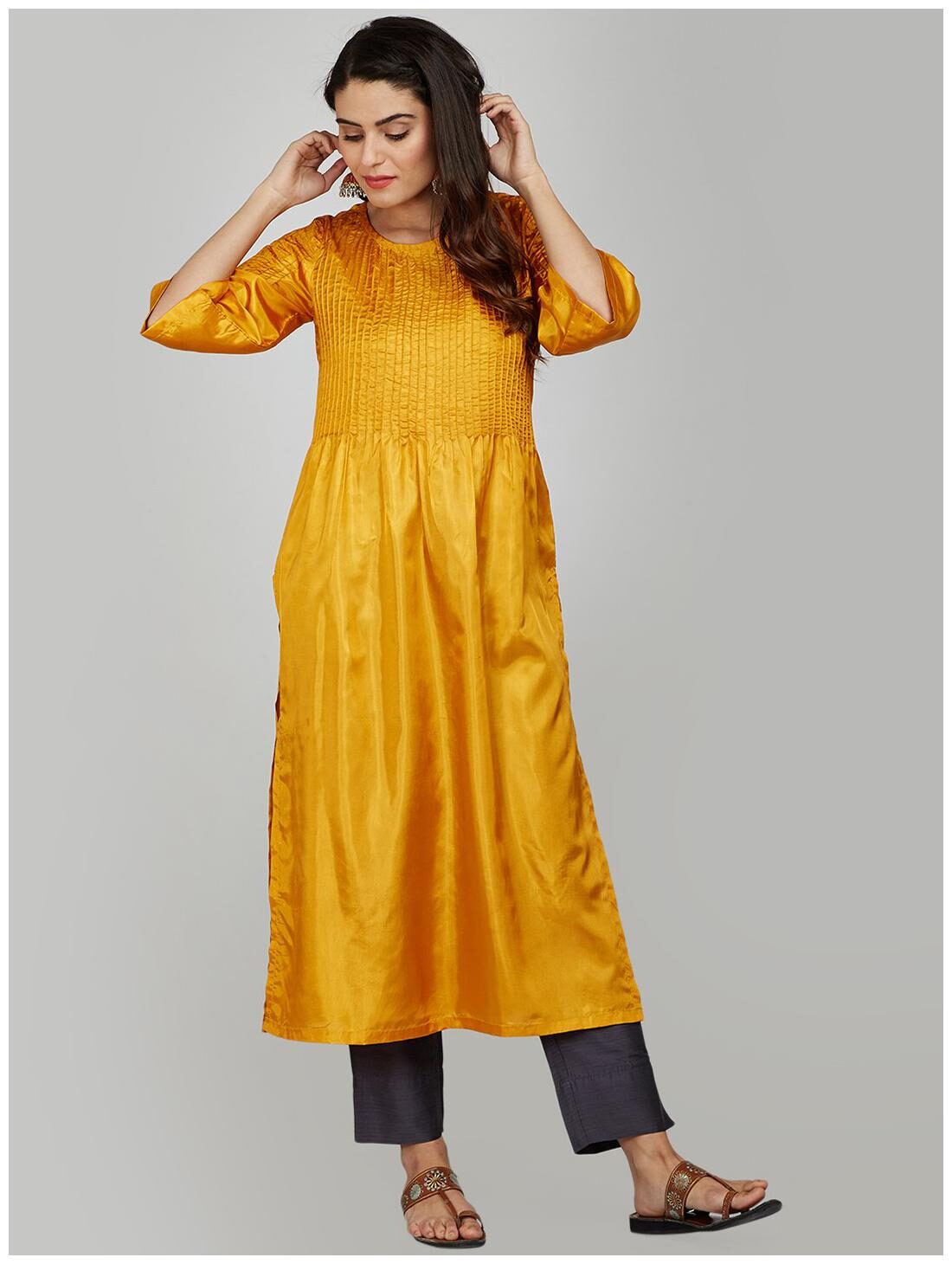 

Lyla Cotton Solid Yellow Kurti For Women