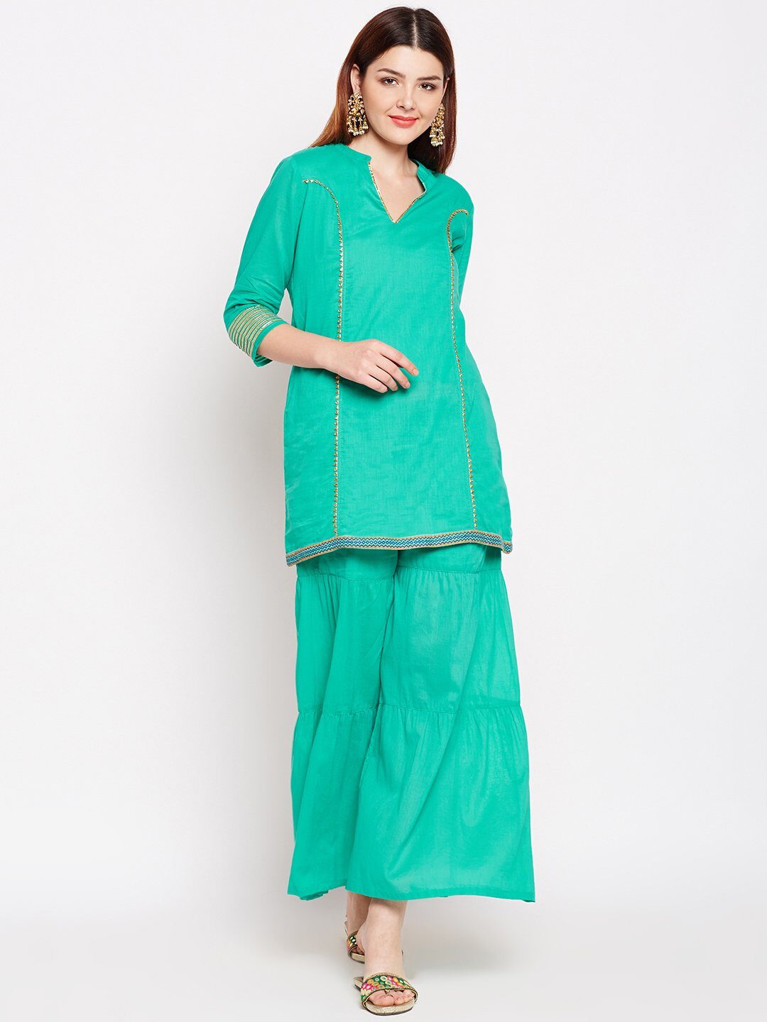 

Lyla Women Green Solid Regular Kurta With Palazzo