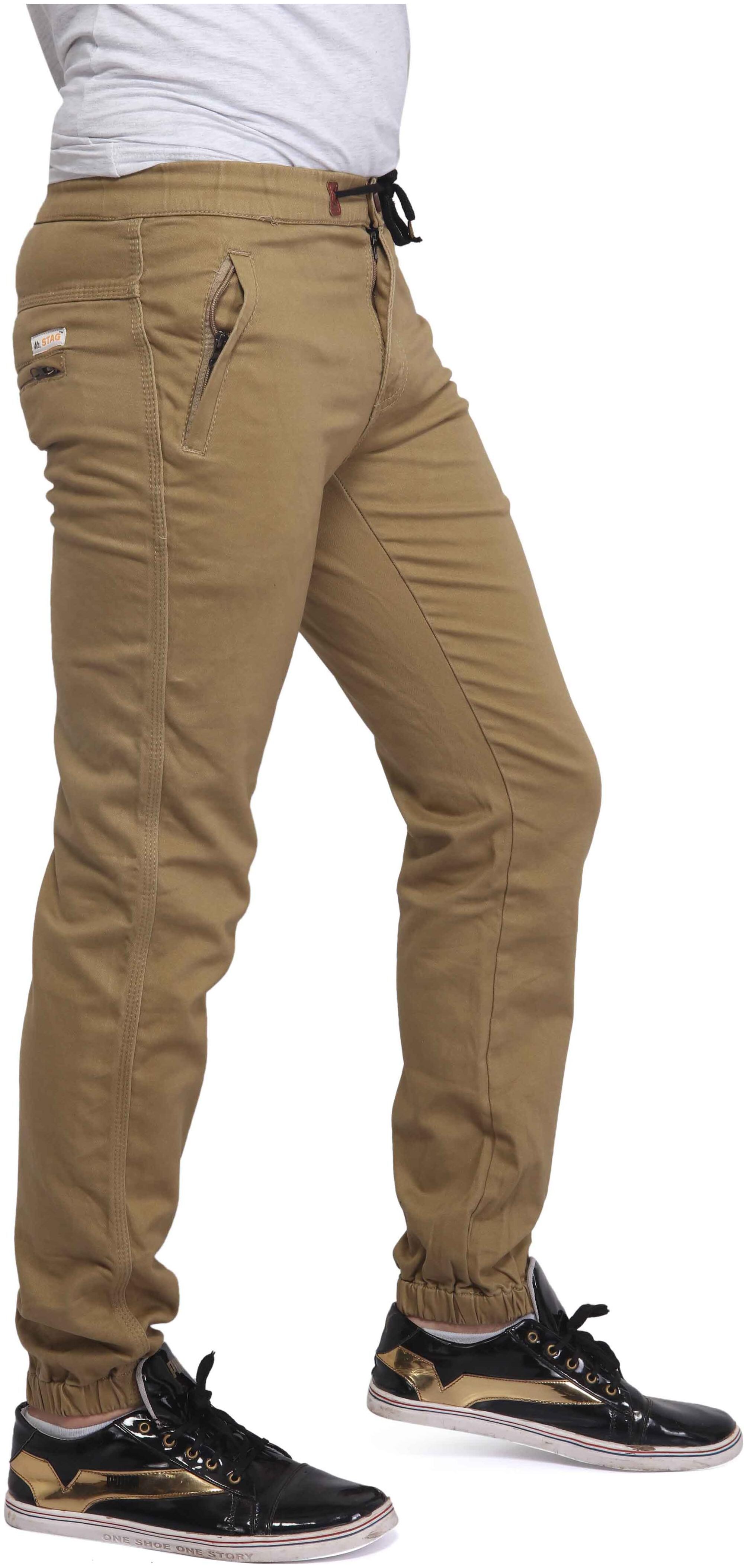 

Mr STAG Men Brown Solid Regular fit Regular trousers
