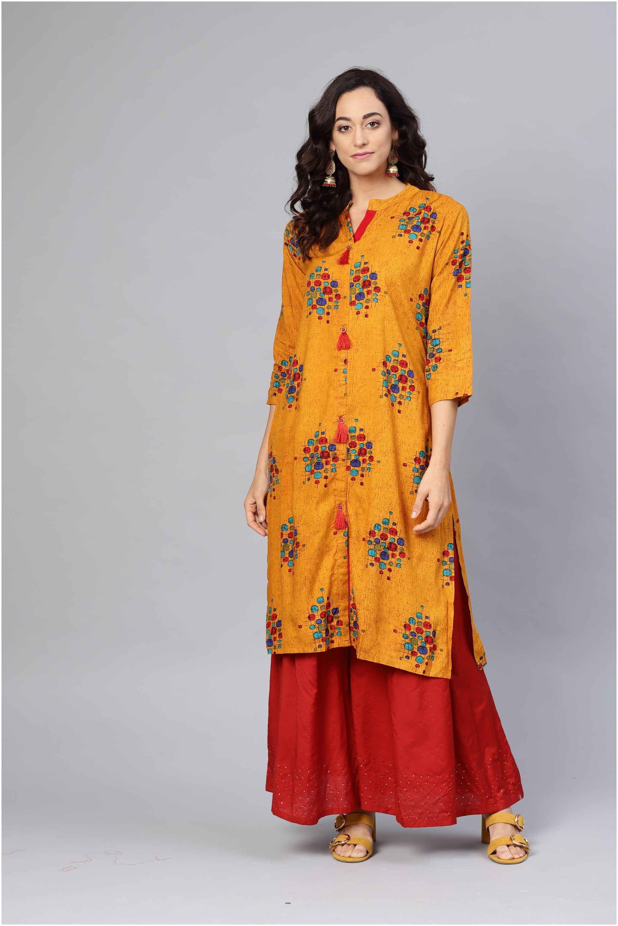 

Myshka Women Yellow Solid Straight Kurta