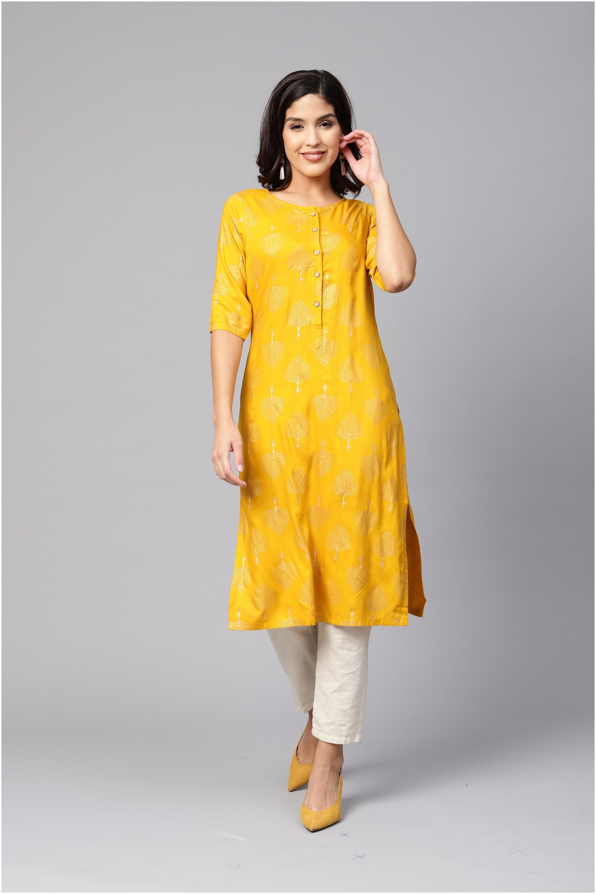 

Myshka Women Yellow Printed Straight Kurta