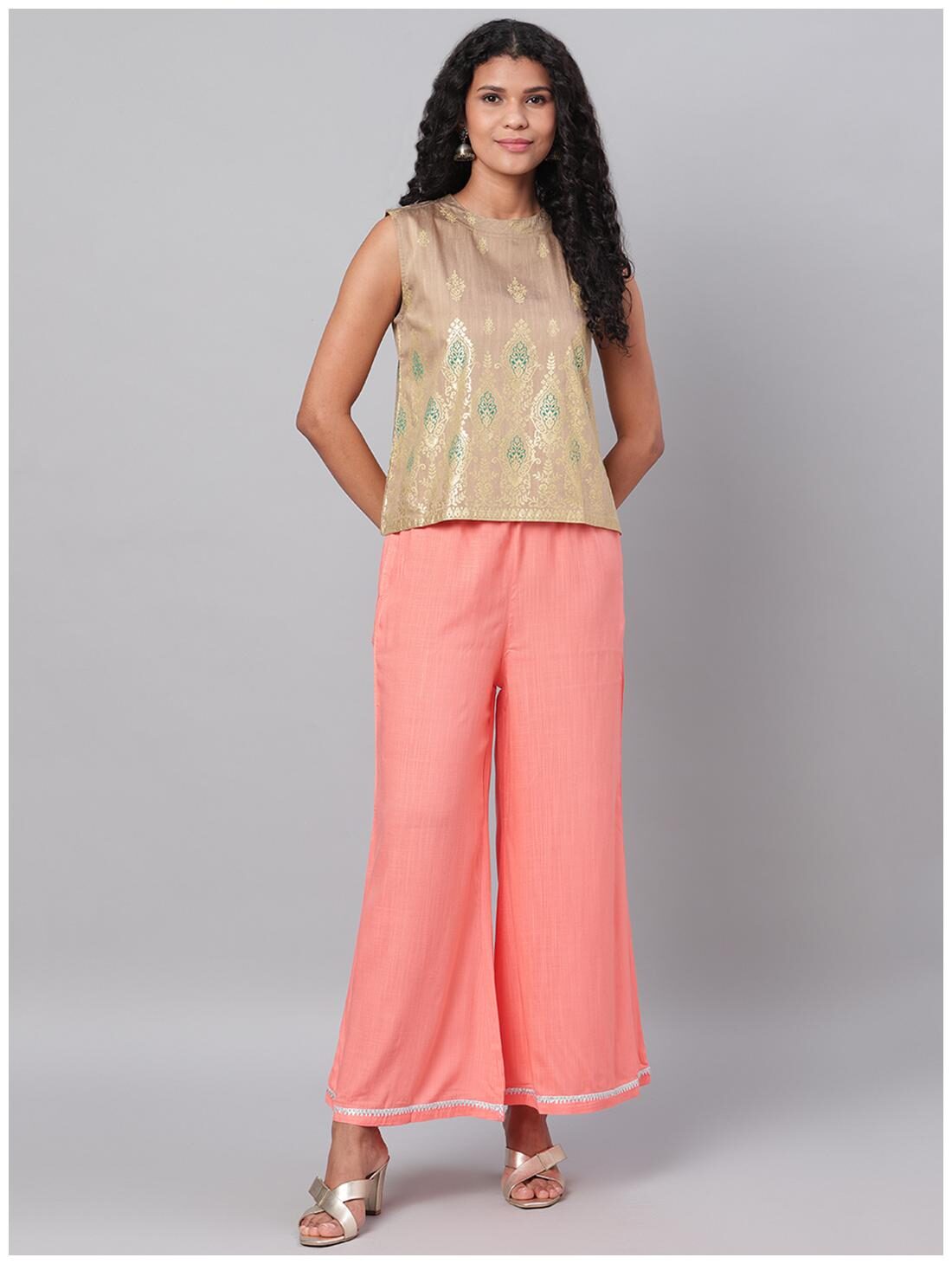 

Myshka Peach Solid Flared Palazzo
