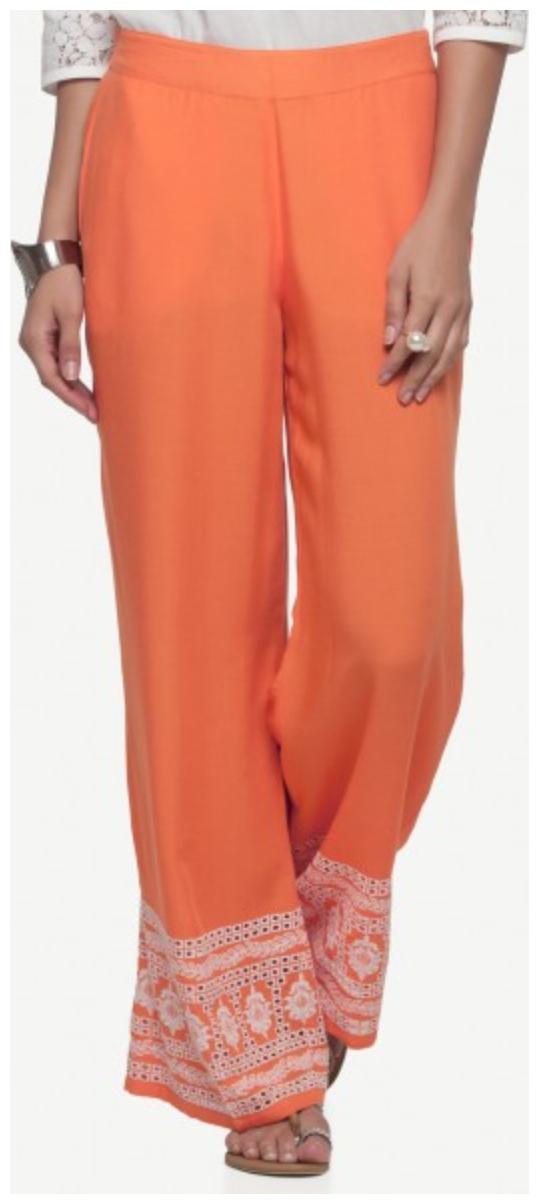

NAARI Rayon Orange Rayon Fabric Loose Fit Embroidered Palazzos For Women