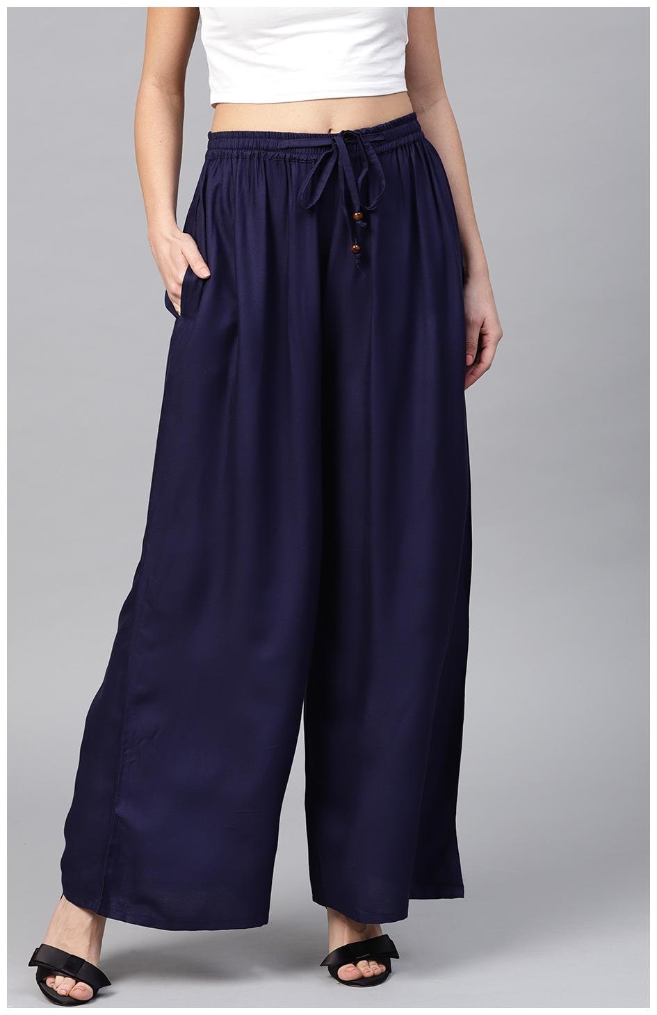 

AASI- HOUSE OF NAYO Blue Solid Flared Palazzo