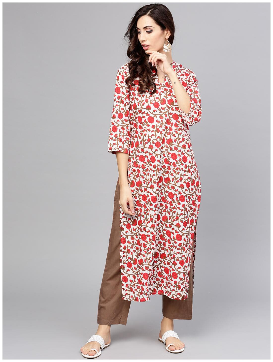 

Off white printed 3 4th sleeve cotton kurta with brown ankle length pant
