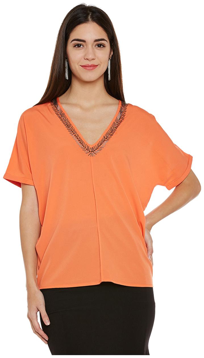 

Oxolloxo Women Solid Regular top - Orange
