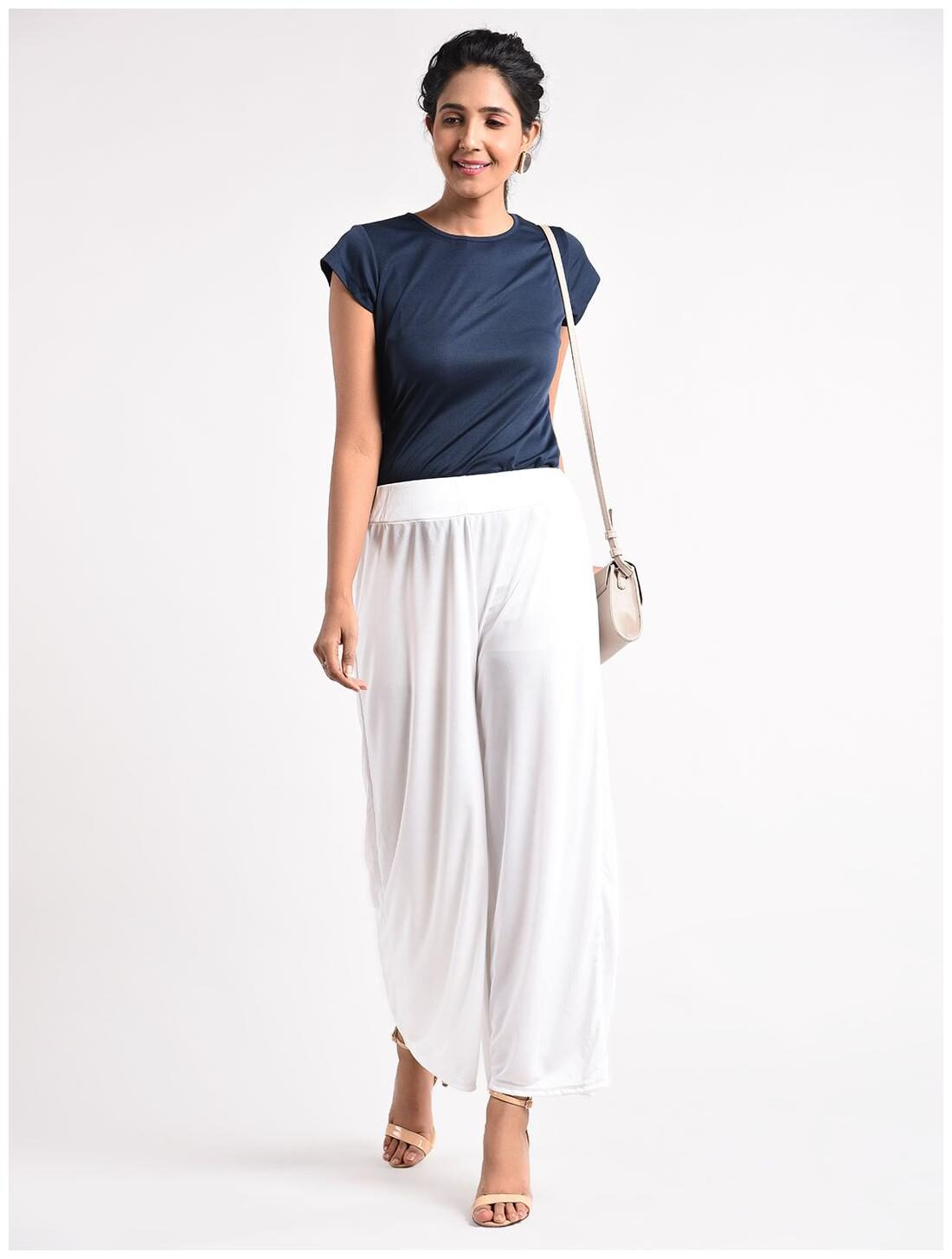 

Paras Fashions White Solid Flared Palazzo
