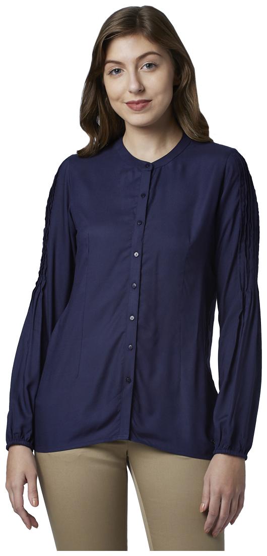 

Park Avenue Women Solid Regular top - Blue