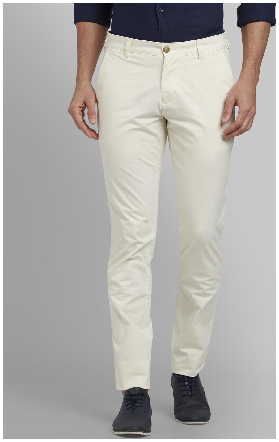 

Parx Men Beige Solid Tapered fit Wrinkle free Regular trousers
