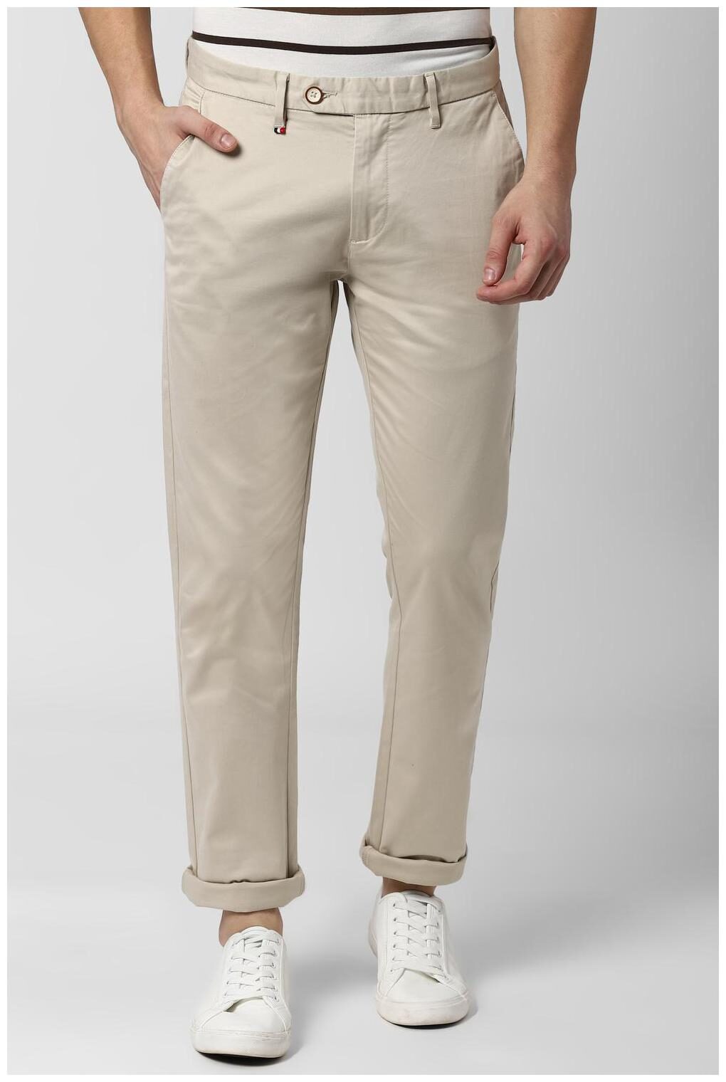 

Peter England Men Cream Solid Slim fit Regular trousers