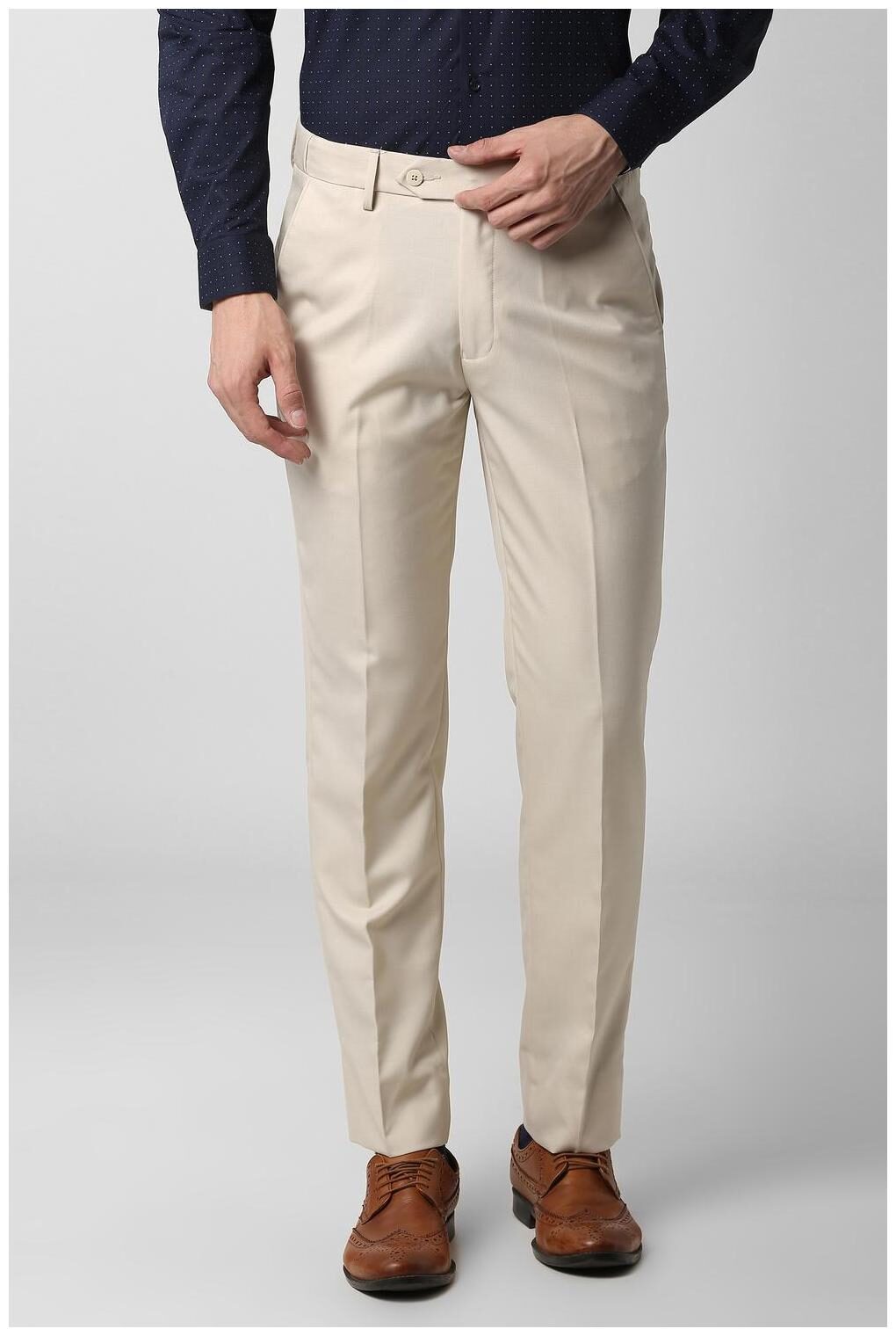 

Peter England Men Beige Solid Slim fit Regular trousers
