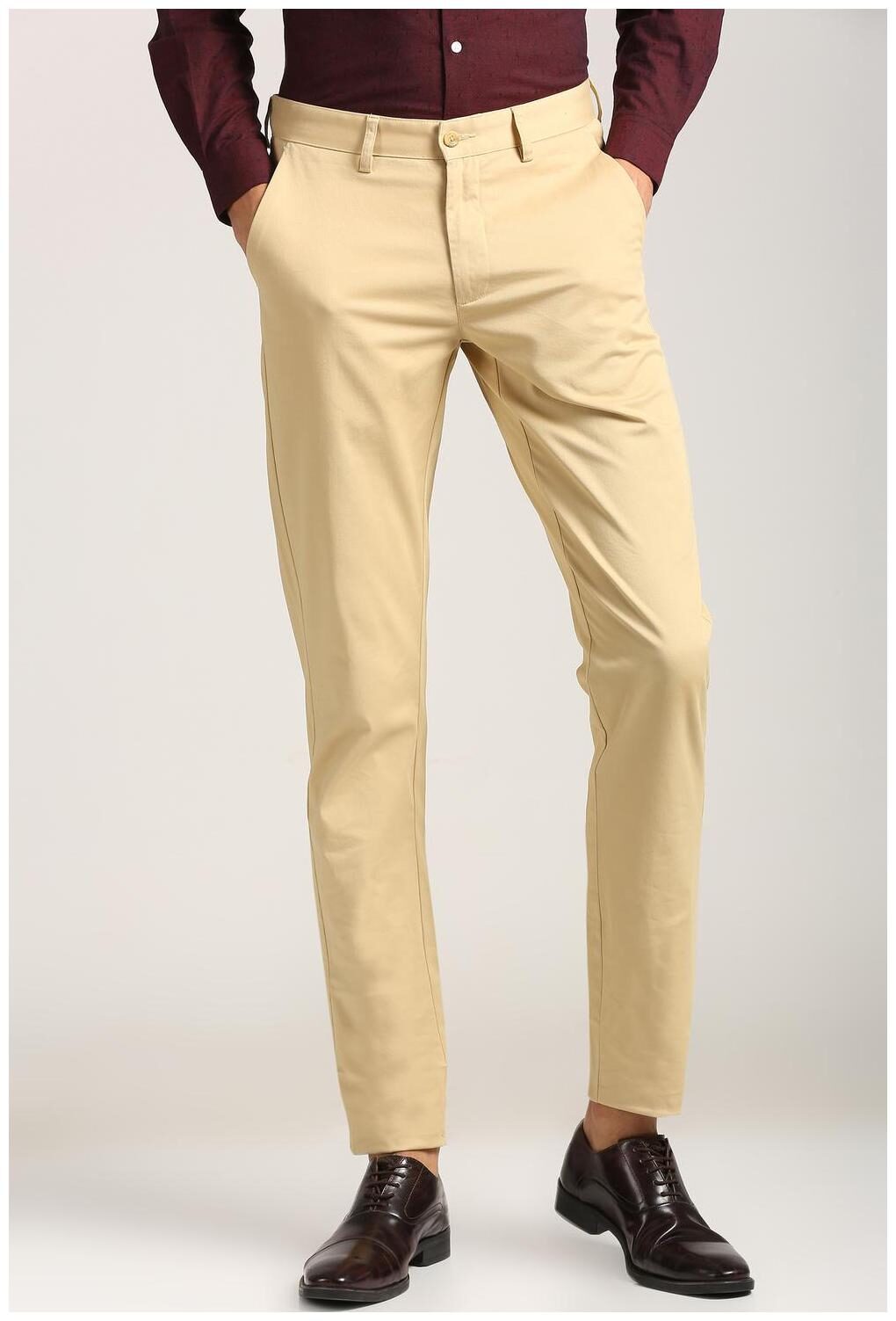 

Peter England Men Beige Solid Slim fit Regular trousers