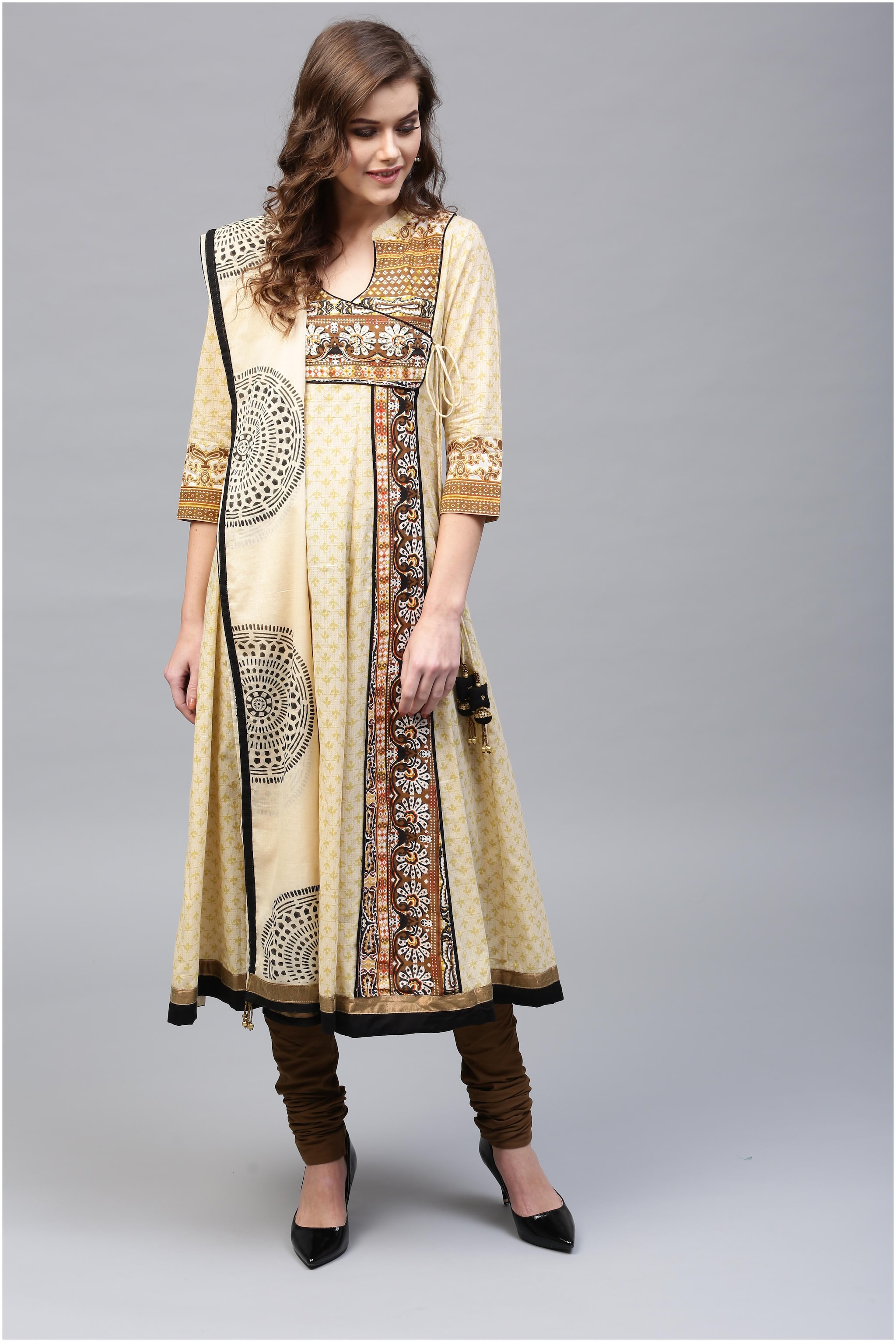 

Rain and Rainbow Cream Solid Kurta Set