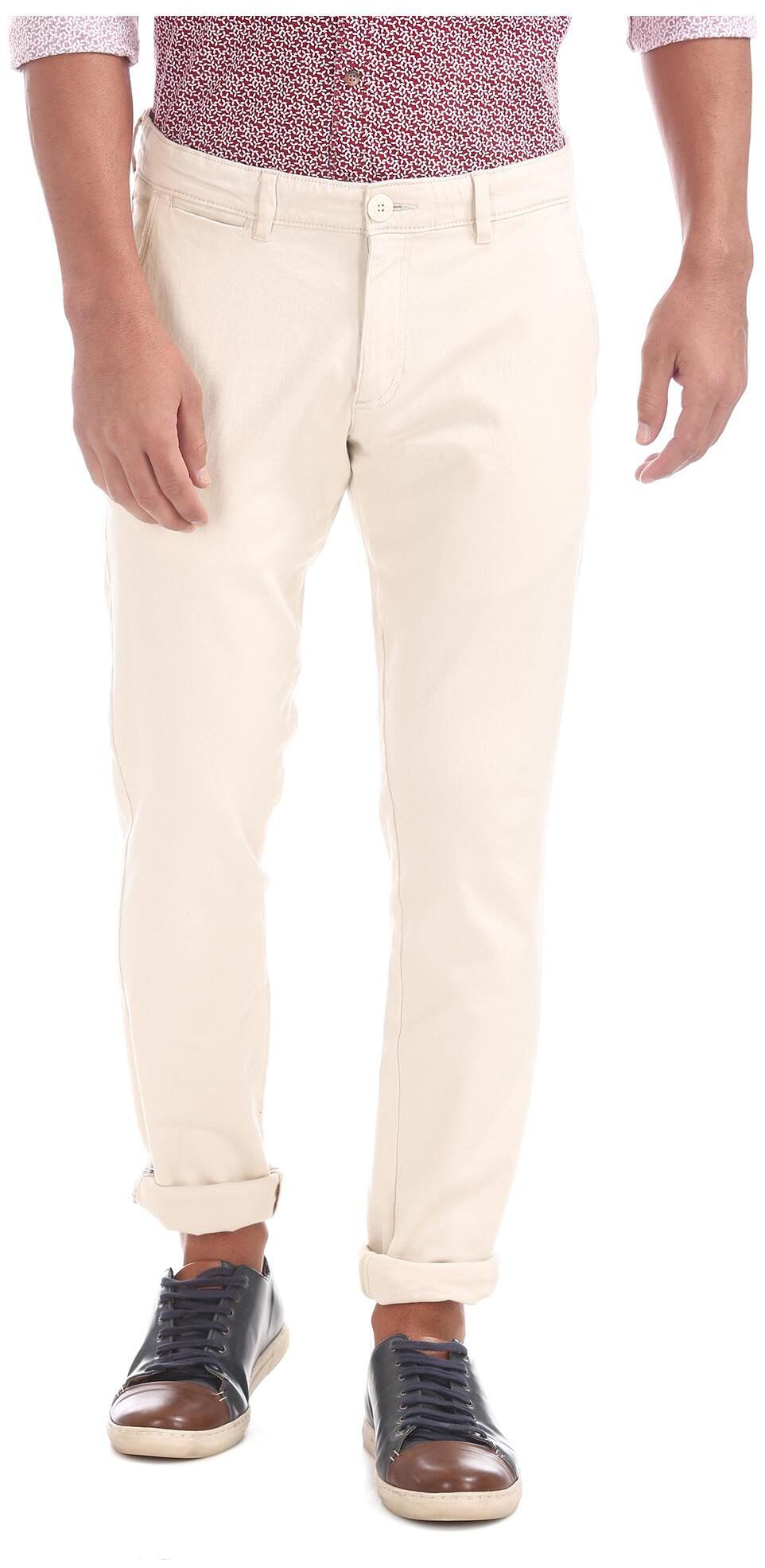 

RUGGERS Men Beige Solid Tapered fit Regular trousers