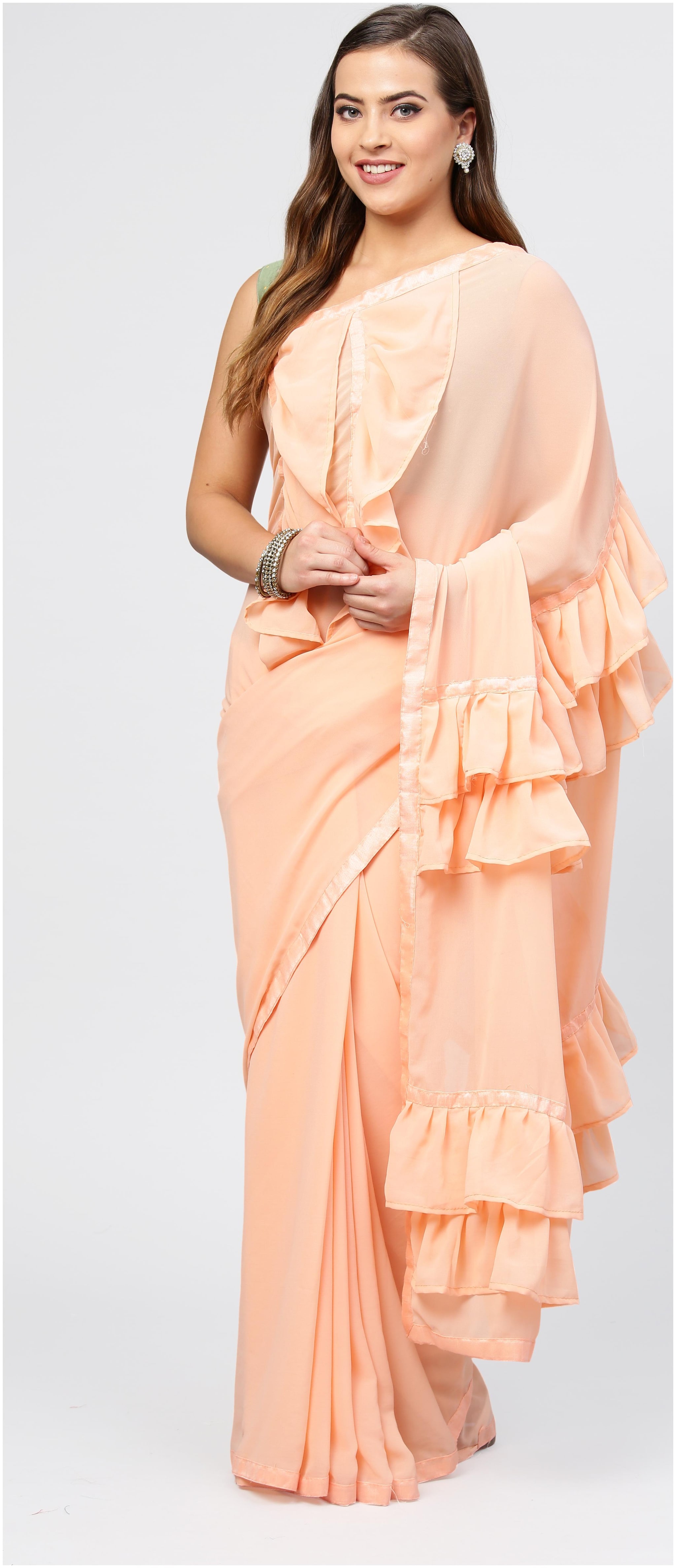 

Saree Mall Peach Party Wear Ruffal Georgette Solid Saree With Unstitched Blouse