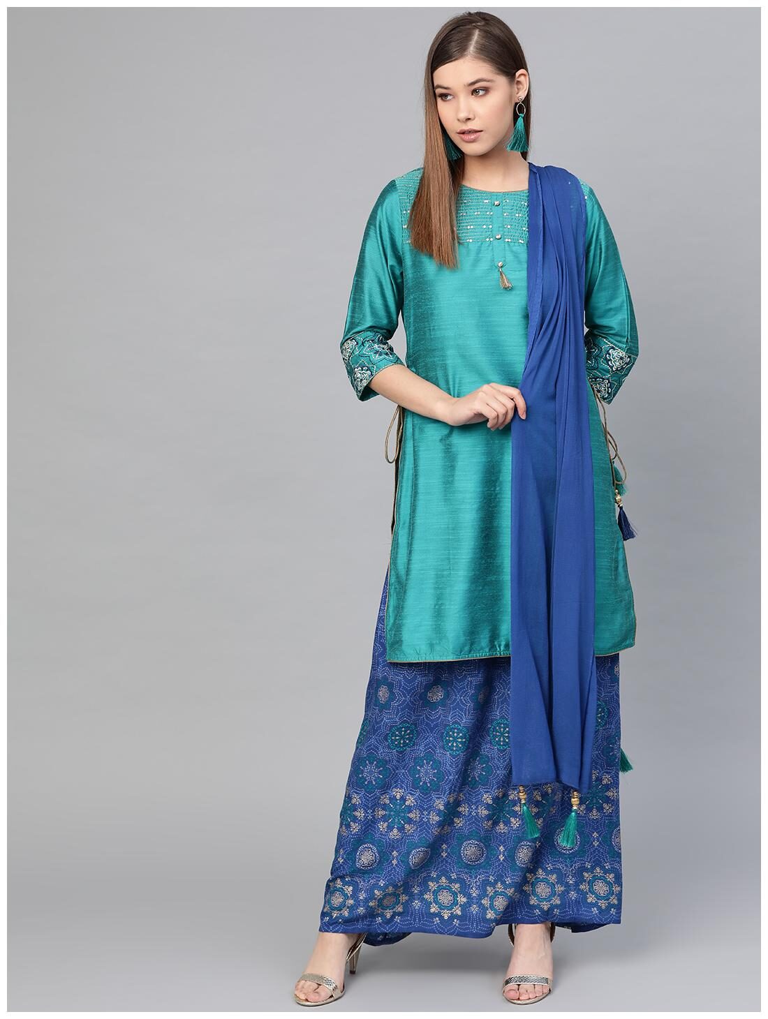 

Shree Women Green Solid Straight Kurta With Skirt And Dupatta