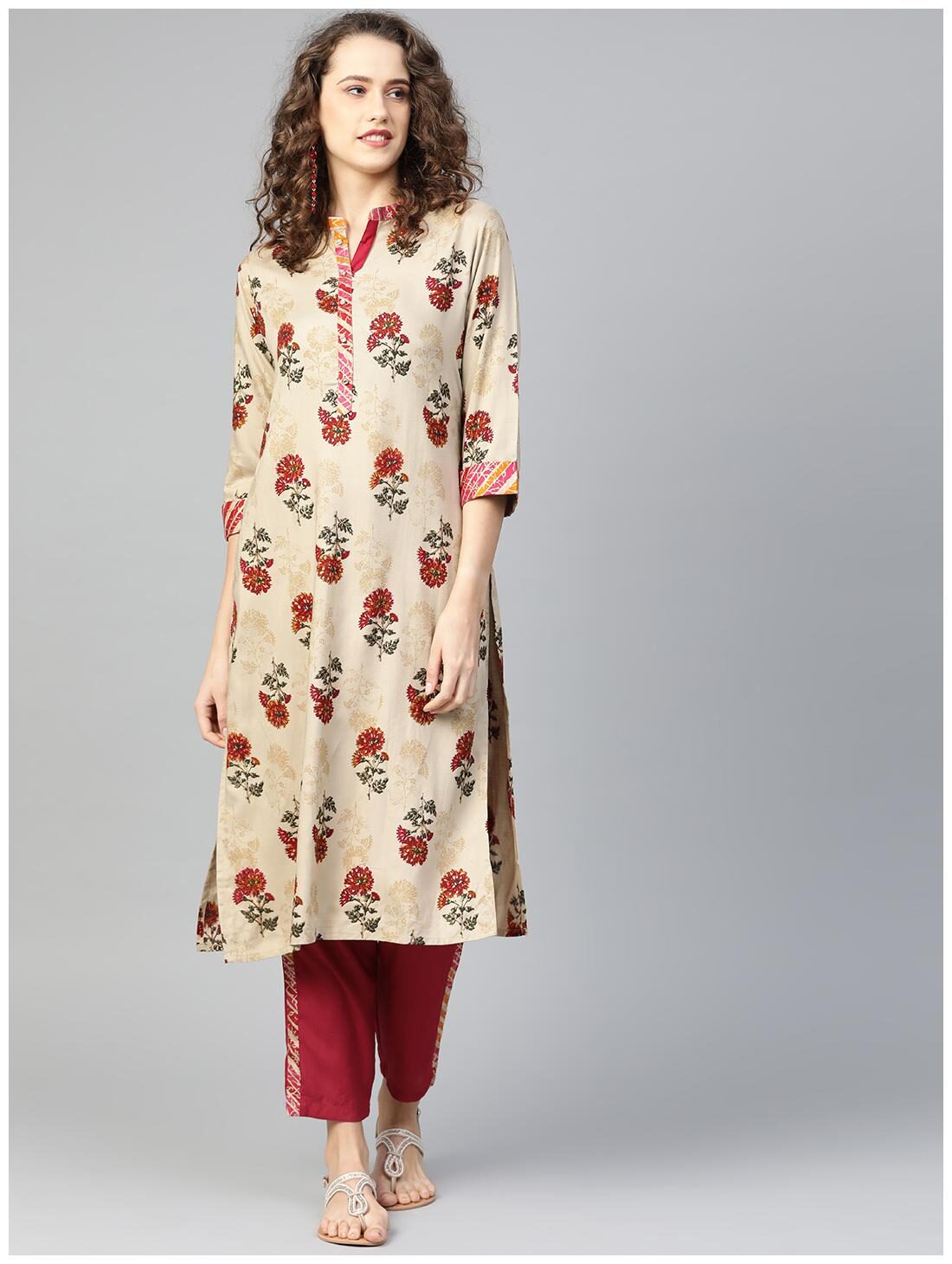 

Shree Women Beige Floral Straight Kurta With Pants