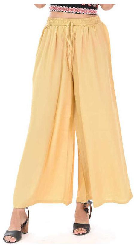 

Skandas Trendz Beige Solid Flared Palazzo