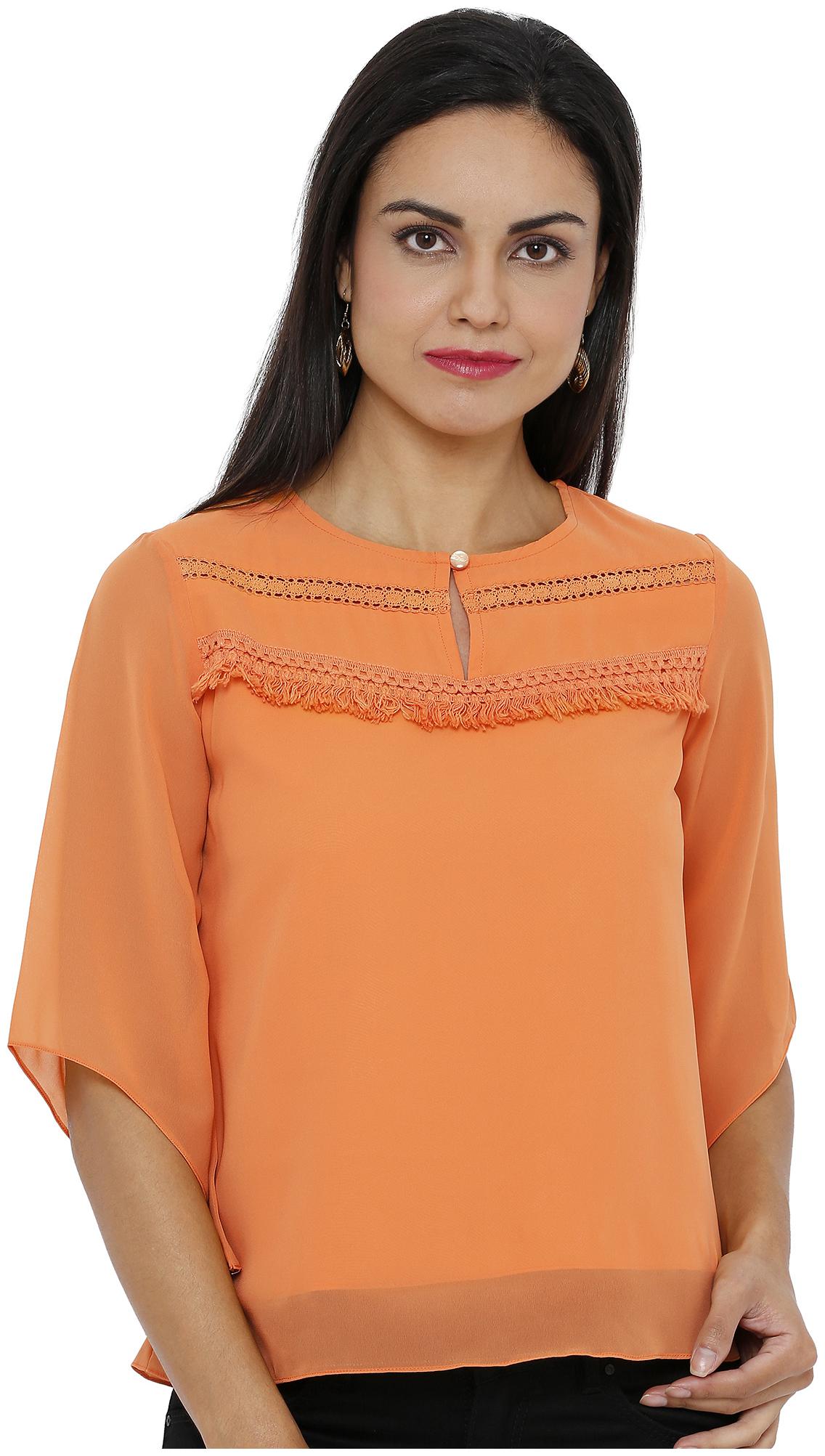 

Soie Women Solid Regular top - Orange