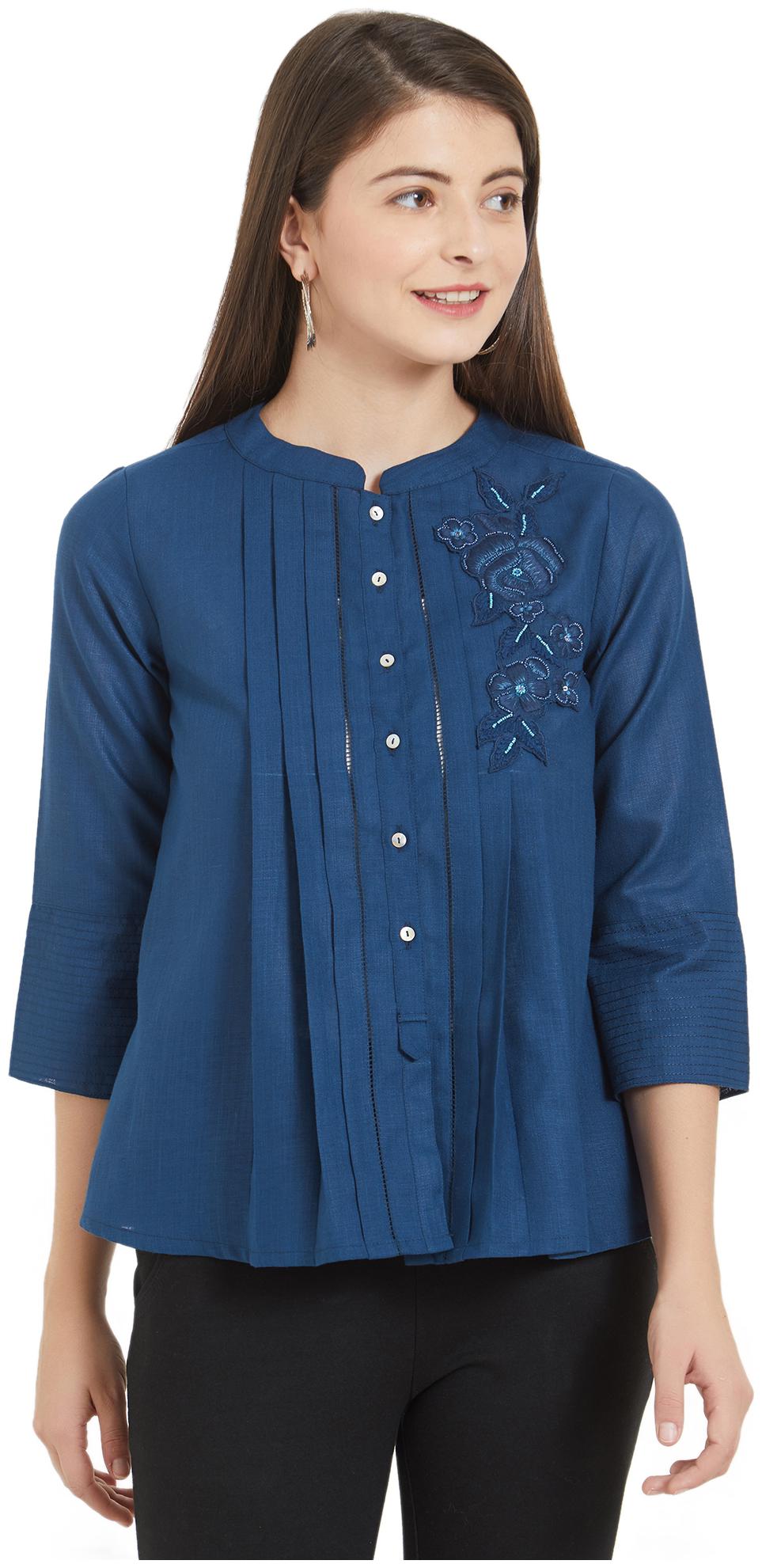 

Soie Women Solid Regular top - Blue