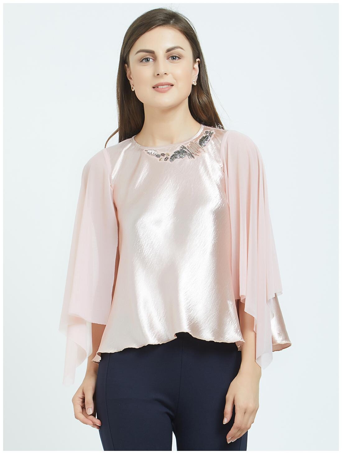 

Soie Women Solid Regular top - Peach