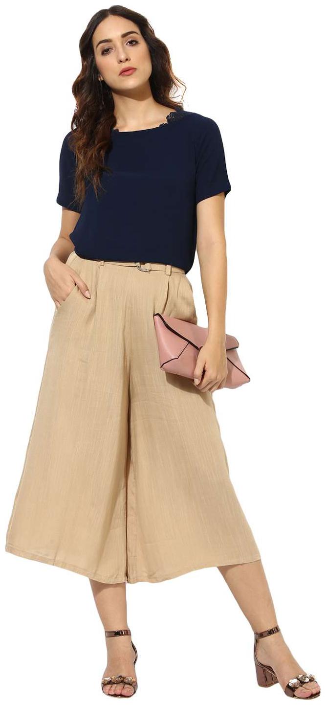 

Soie Women Solid Regular top - Blue