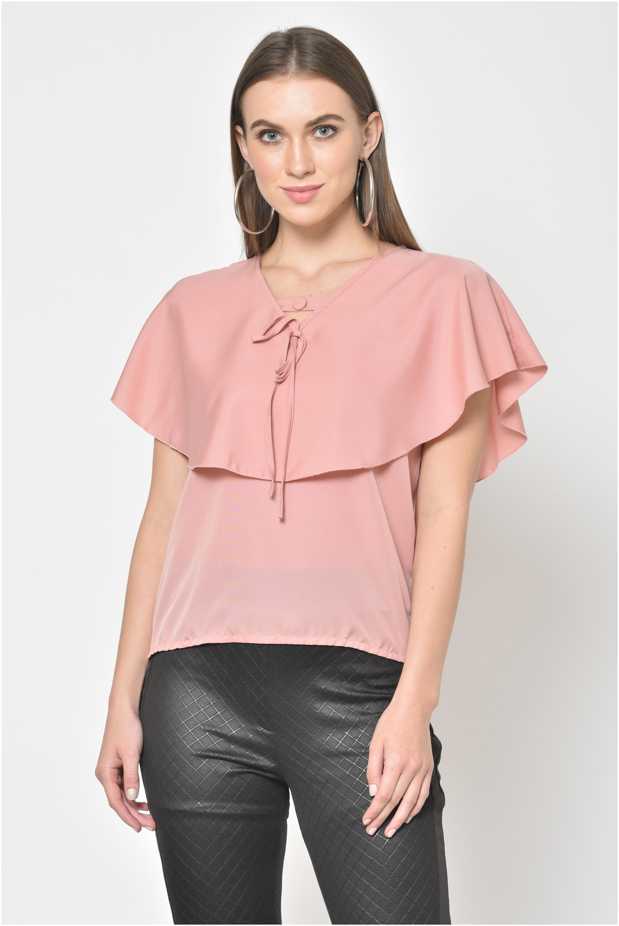 

Styloriyam Women Solid Regular top - Pink