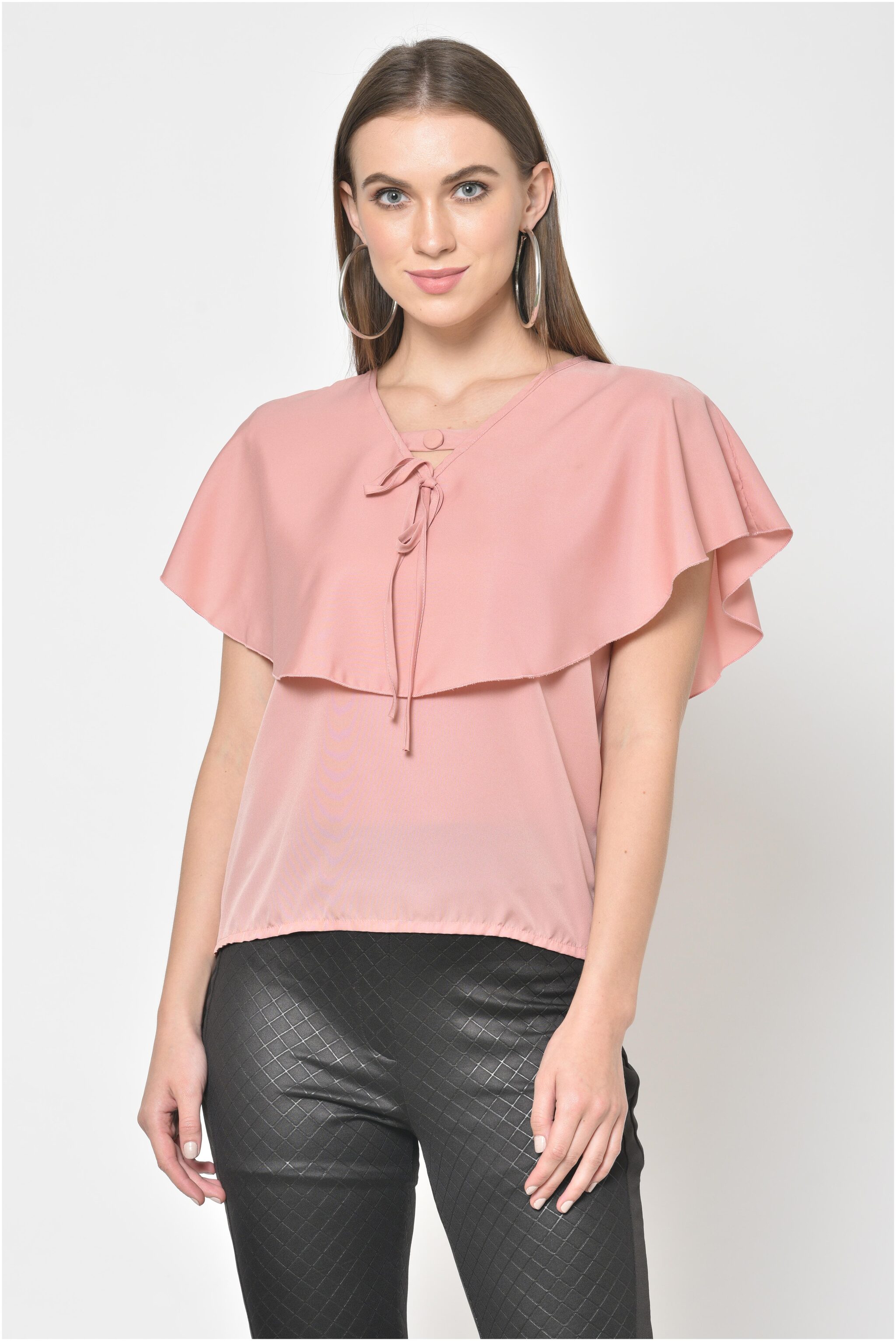 

Styloriyam Women Solid Regular top - Pink