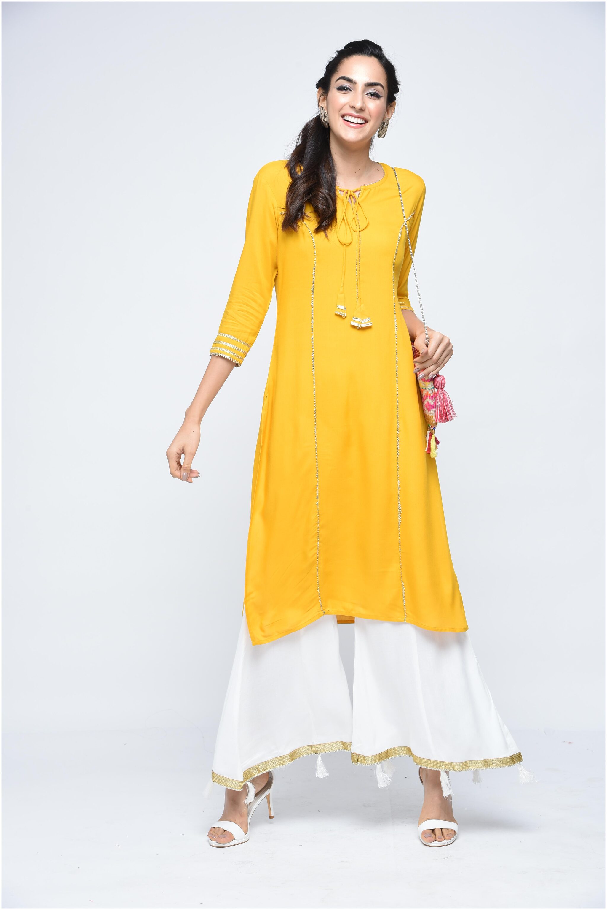 

Stylum Women Yellow Solid Straight Kurta