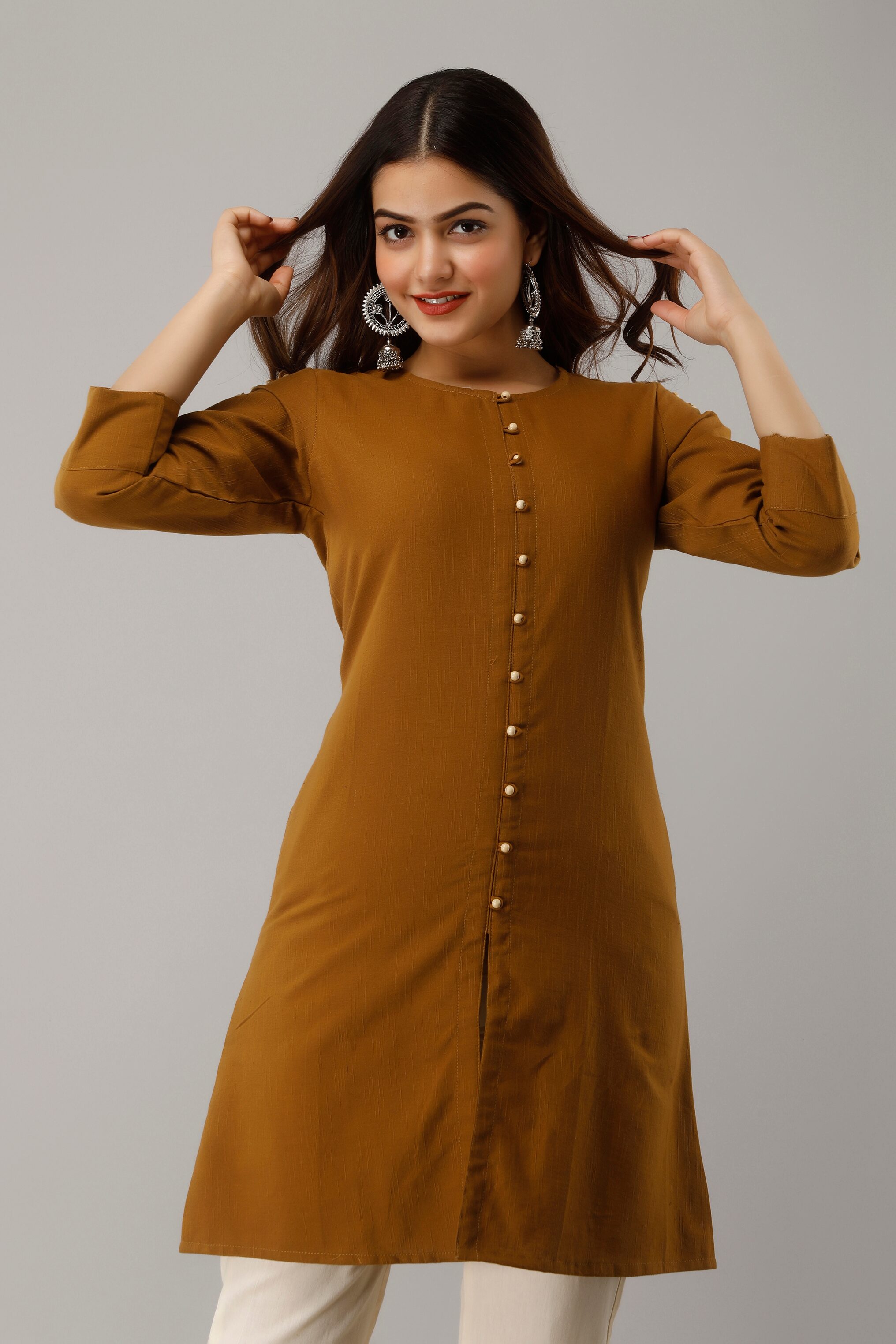 

SVARCHI Women Solid Regular tunic - Brown