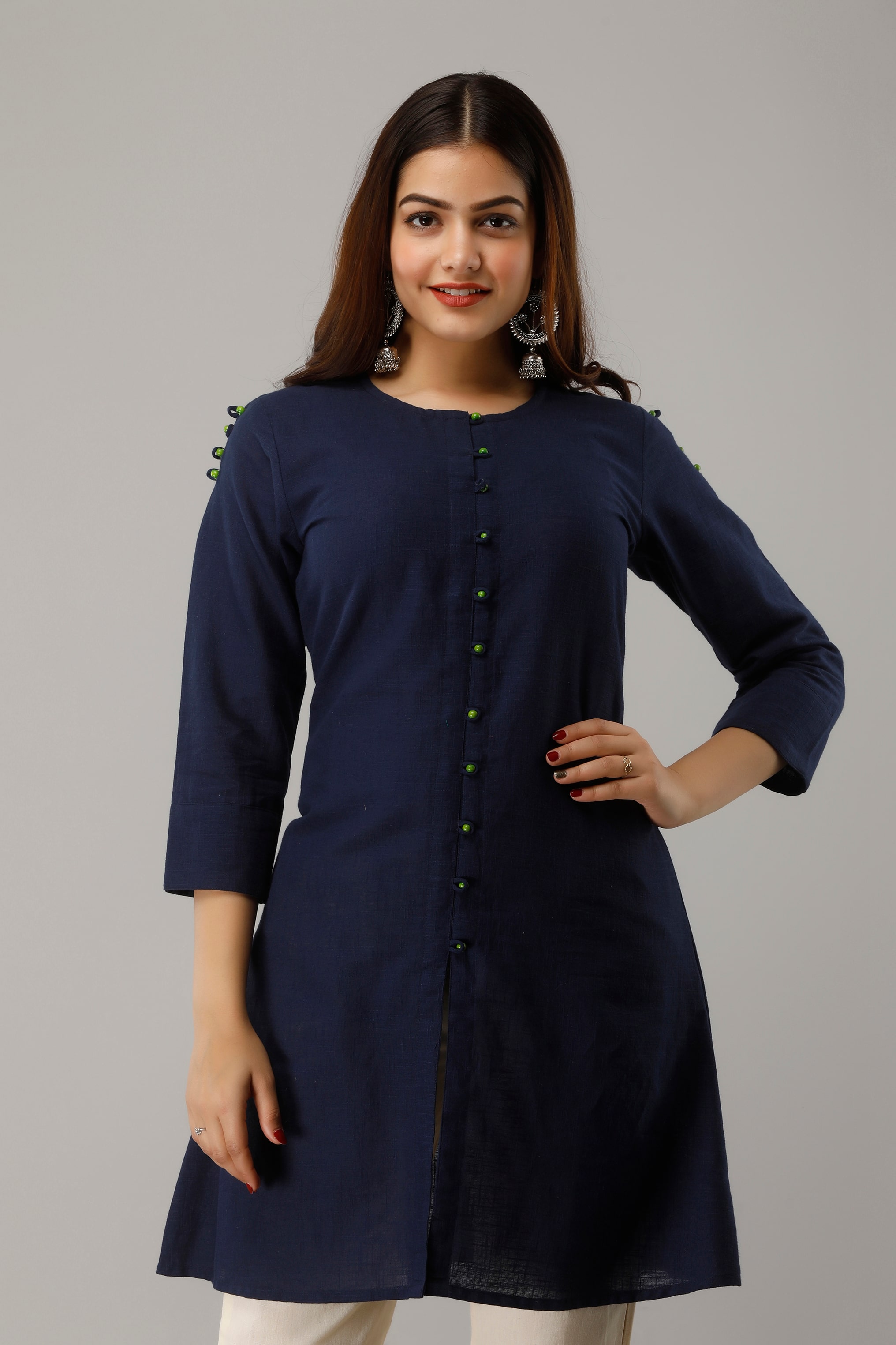 

SVARCHI Women Cotton Solid Navy Blue Regular Tunic