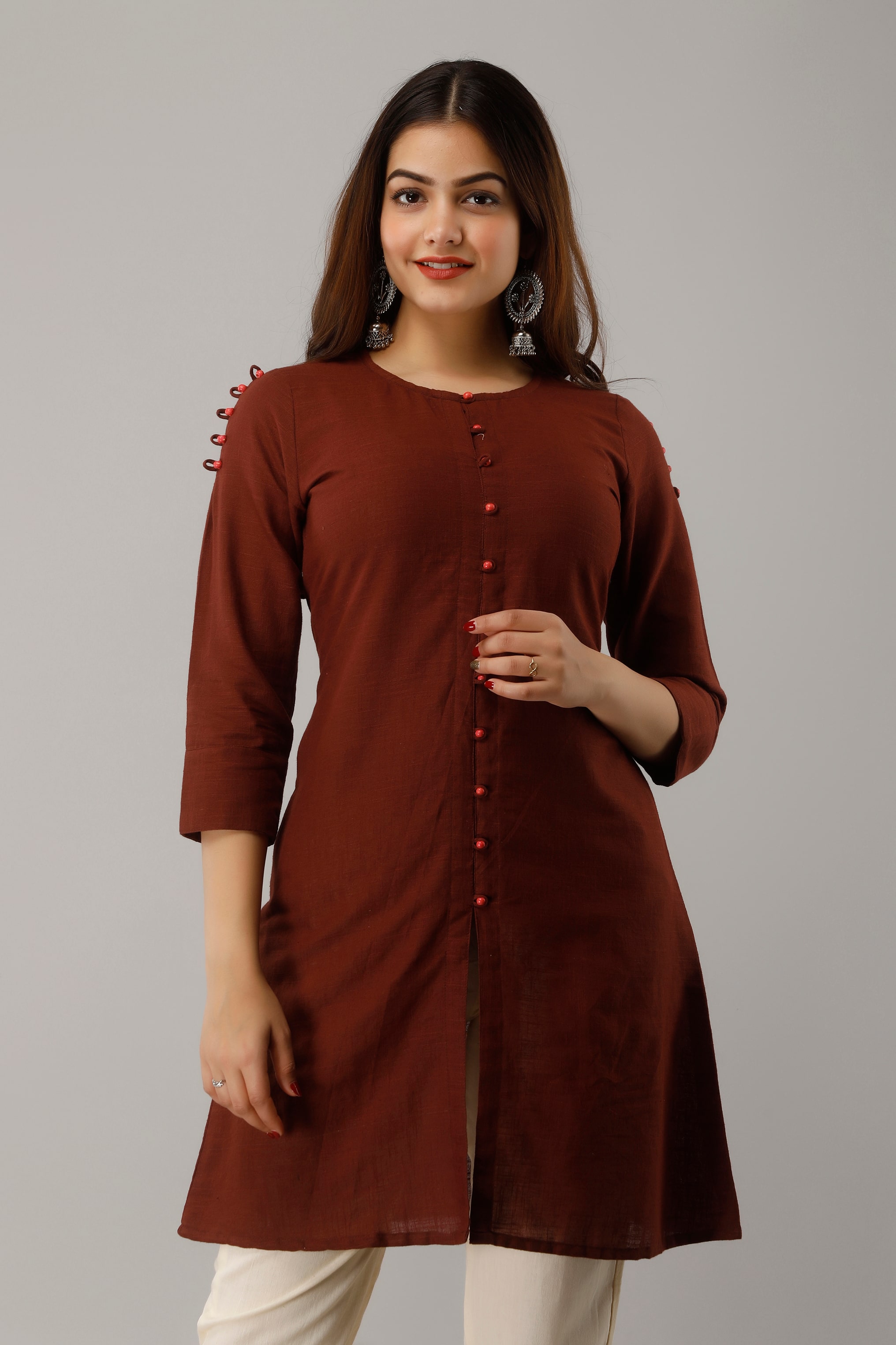 

SVARCHI Women Solid Regular tunic - Brown