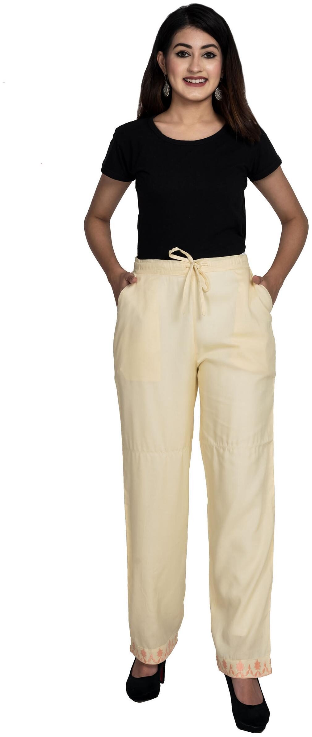 

Swasti Blended Solid Cream Color Regular Pant For Women