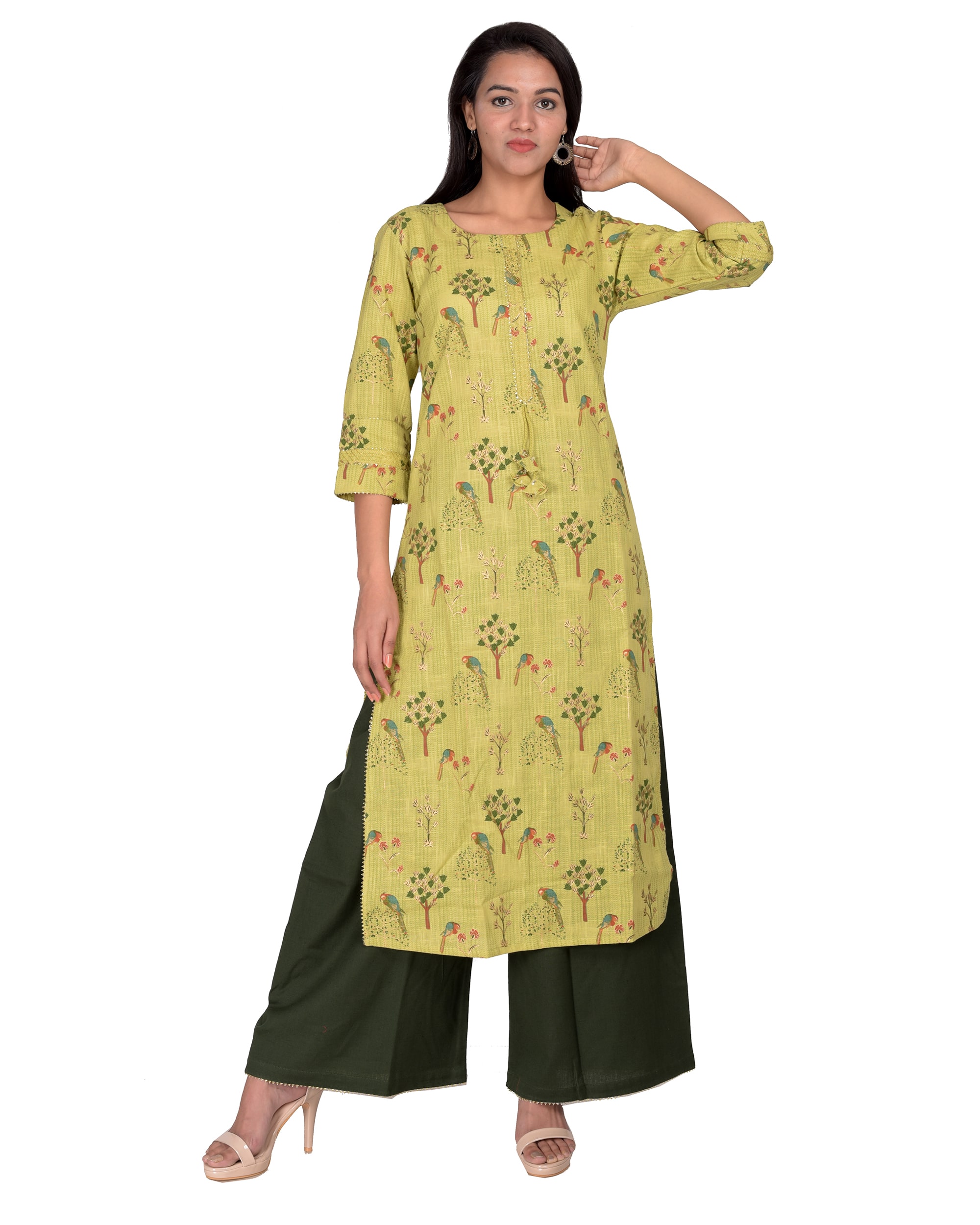 

Swasti Women Green Printed Regular Kurti With Palazzo