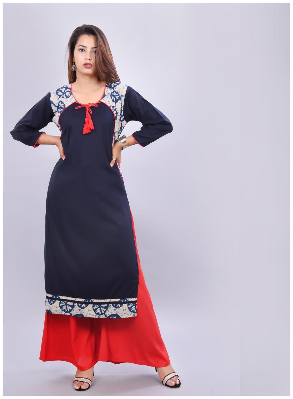 

Vedana Rayon Solid Print Combination Kurta with Flared Palazzo (Blue)