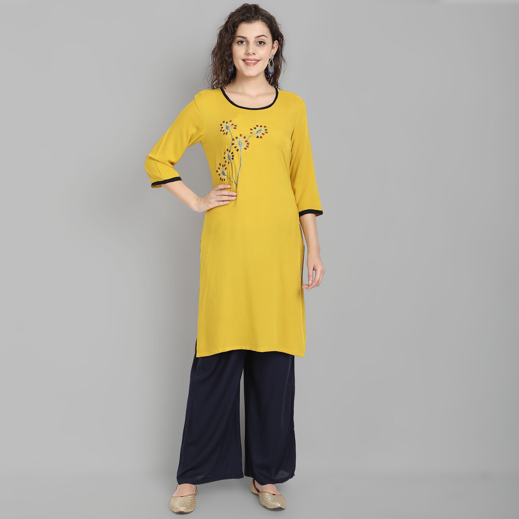 

Venika Creations Women Viscose Rayon Embroidered Yellow Kurta With Palazzo