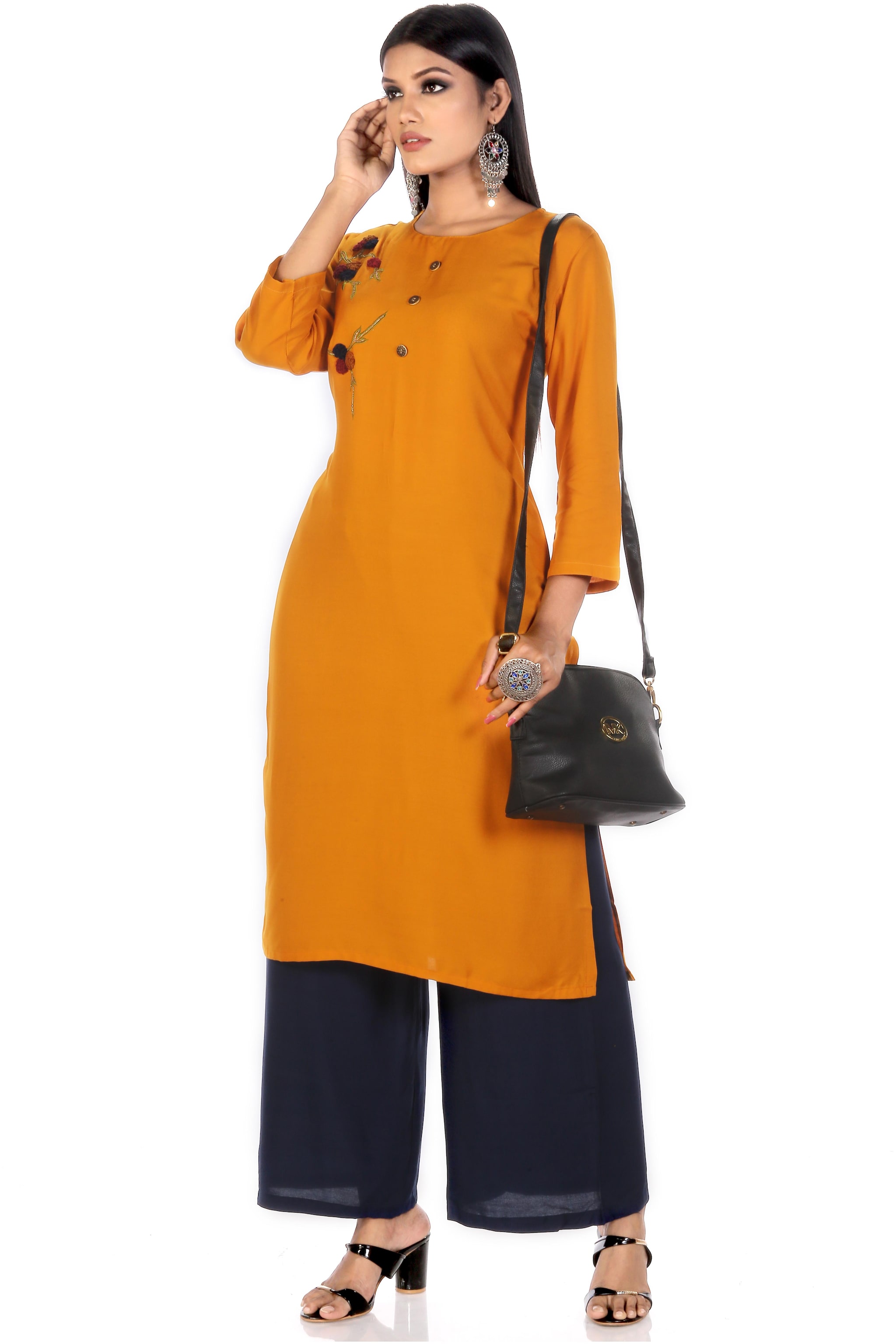 

Venika Creations Women Viscose Rayon Embroidered Yellow Kurta With Palazzo