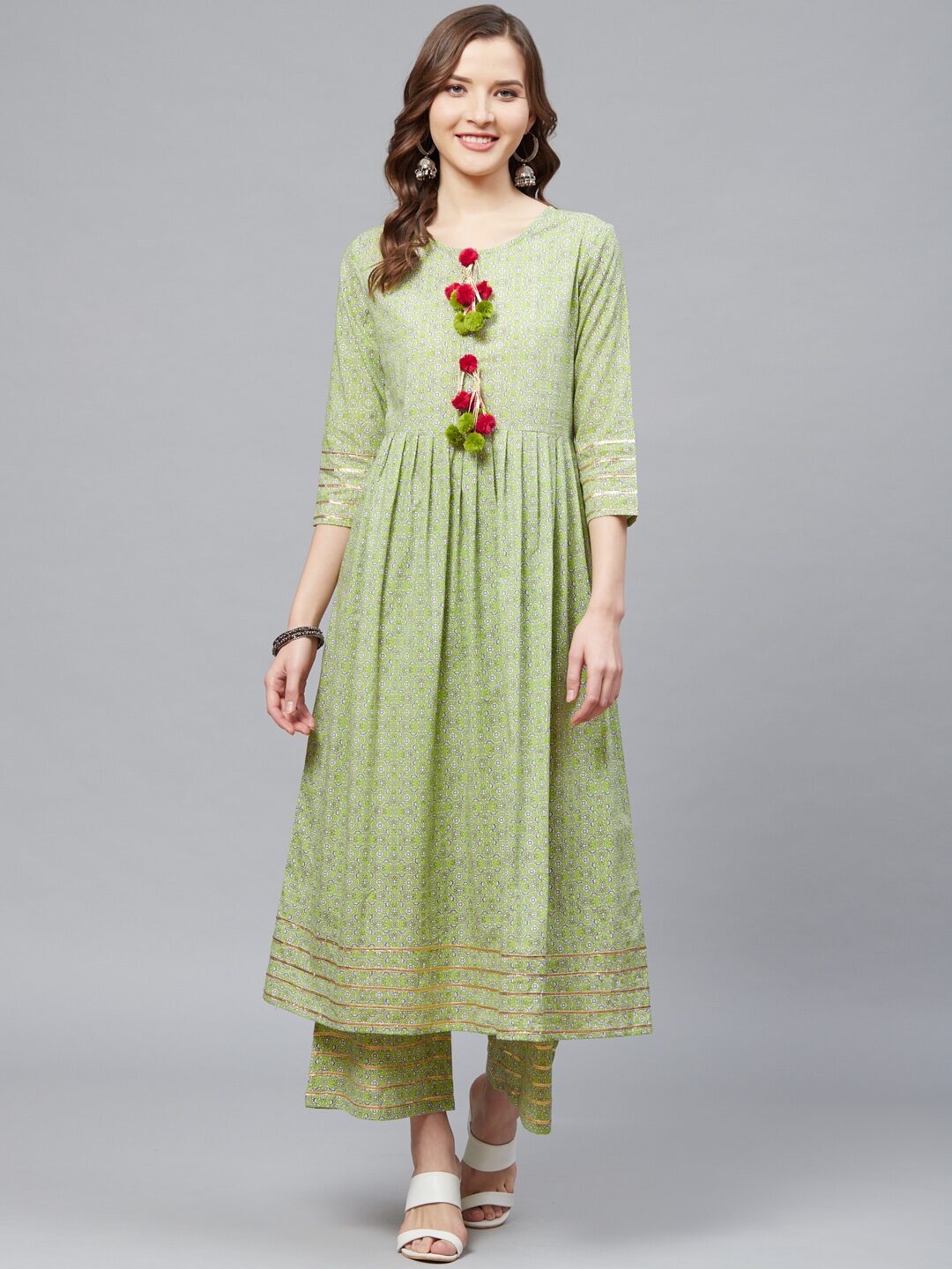 

Yash Gallery Women Green Floral Regular Kurta With Palazzo