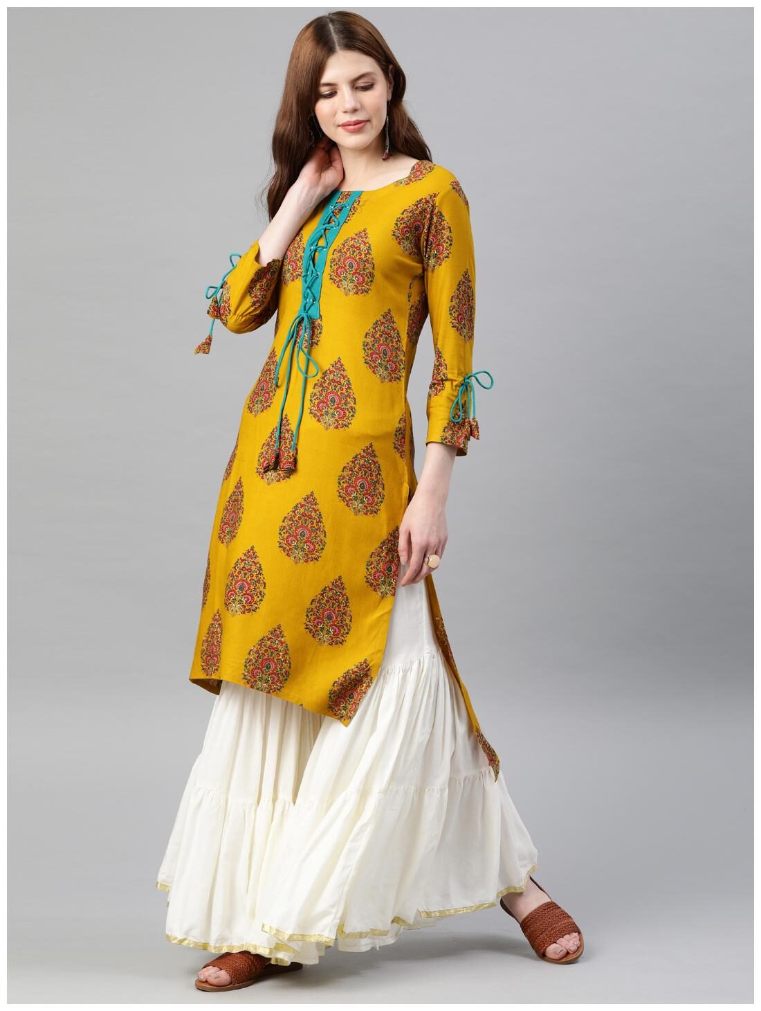 

Yash Gallery Women Mustard Floral Assymetrical Kurta