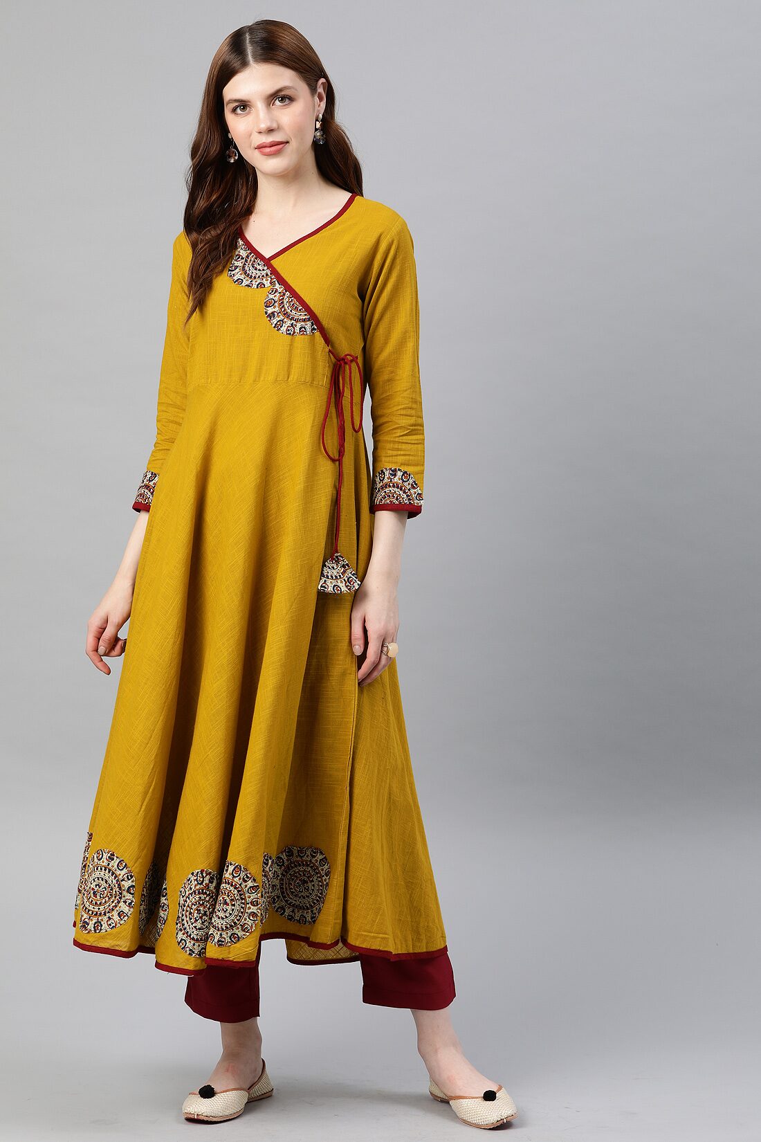 

Yash Gallery Women Yellow Printed Angrakha Kurta