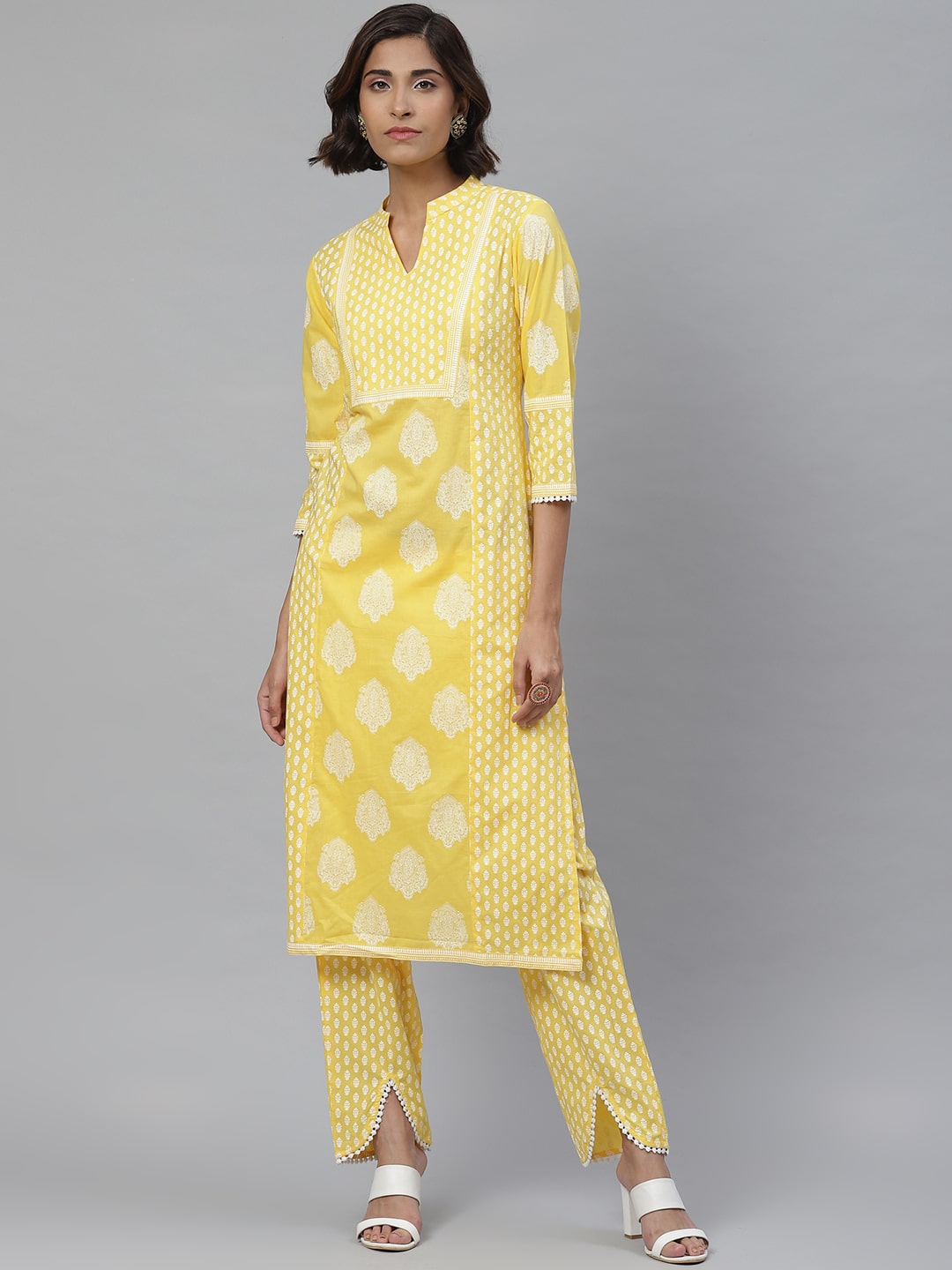 

Yash Gallery Women Yellow Floral Straight Kurta With Pants