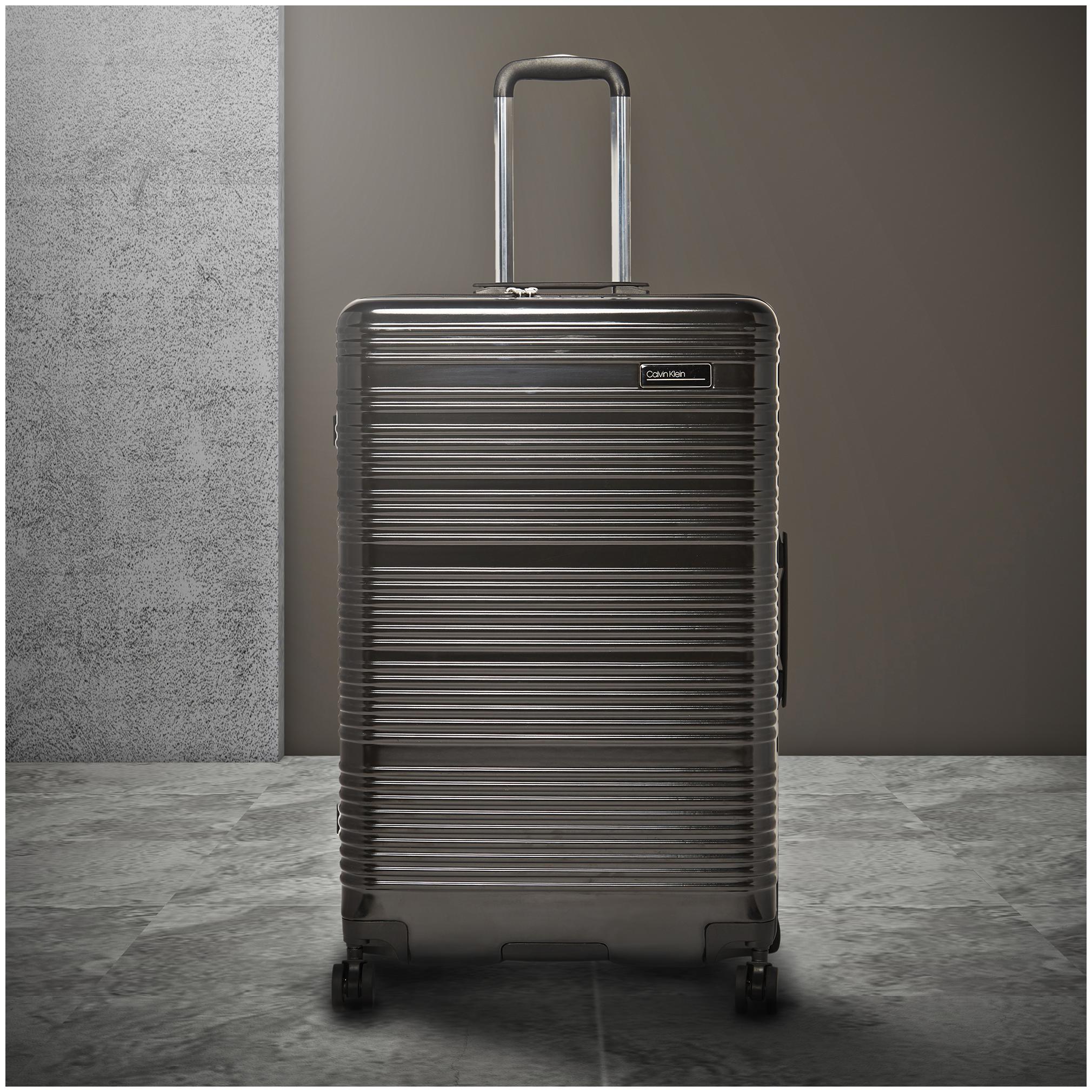 

Calvin Klein Globetrotter Hard Body Large Black Trolley Bag (LH818GT9L02)