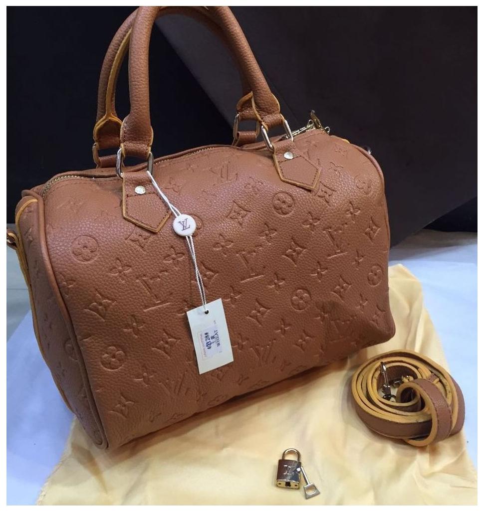

ARTISTIC INDIA Brown Synthetic Handheld Bag