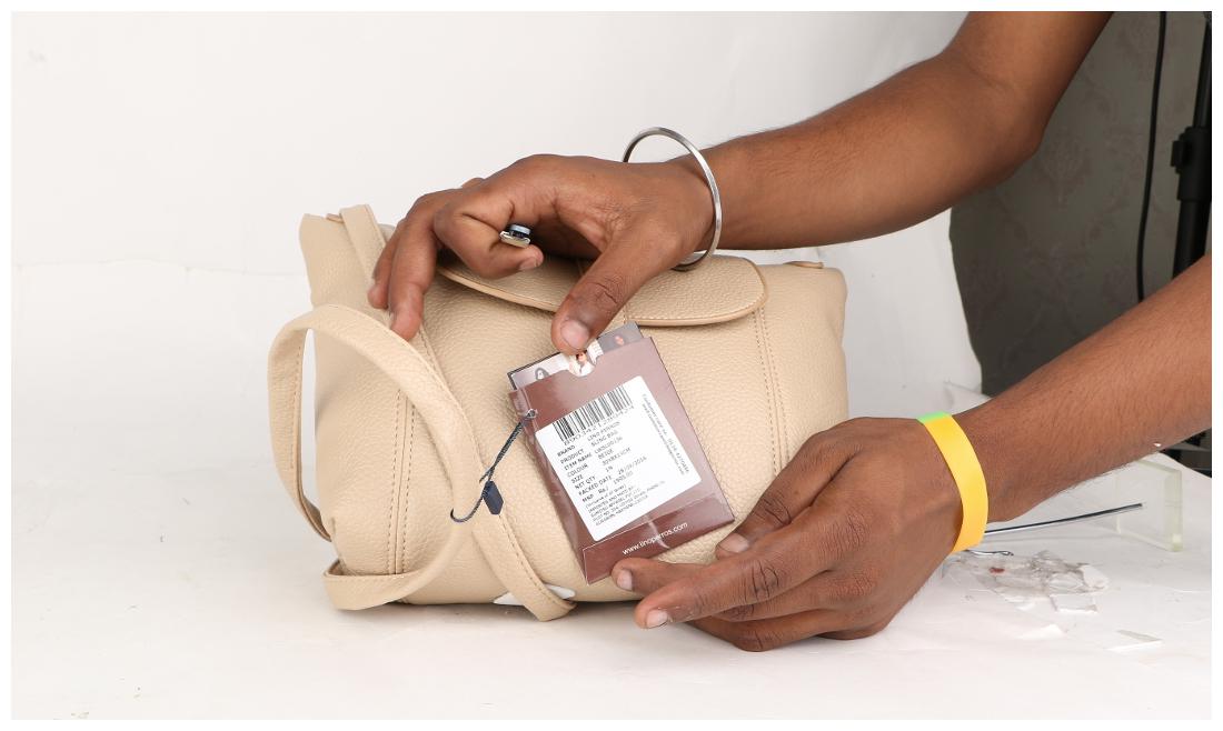

Lino Perros Beige Sling Bag