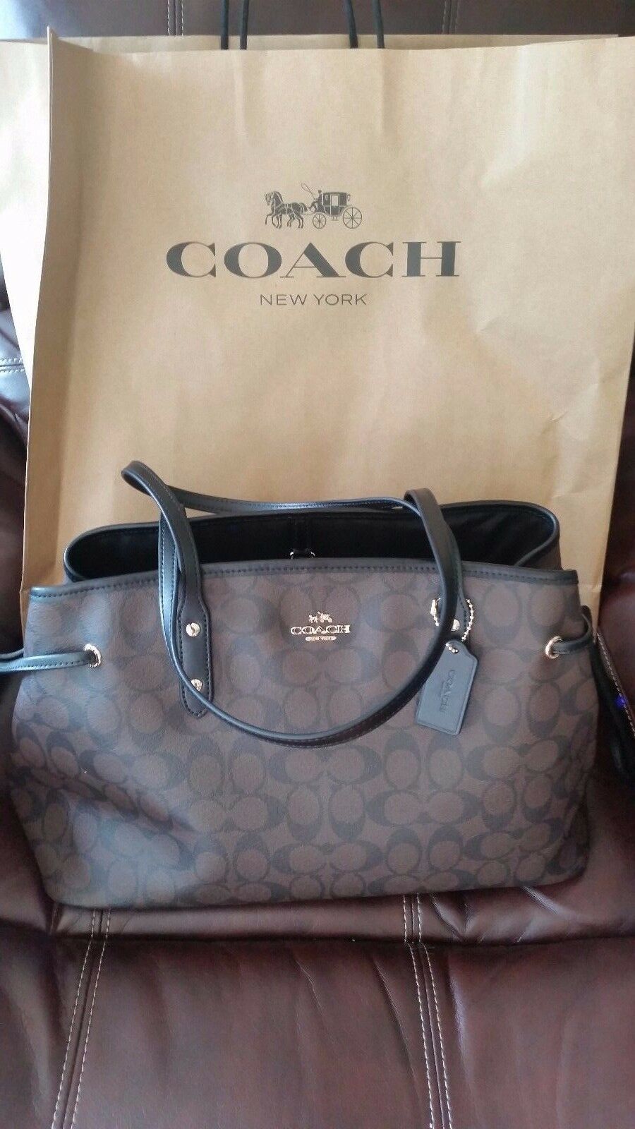 

NWT Coach F57842 Signature Drawstring Carryall Shoulder Bag in Brown Black