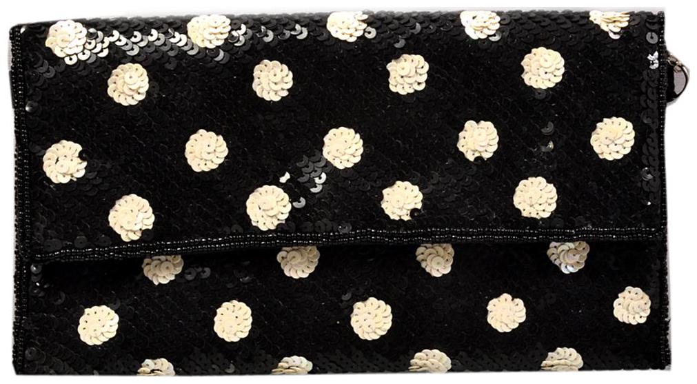 

Rezzy Women Black Canvas Clutch