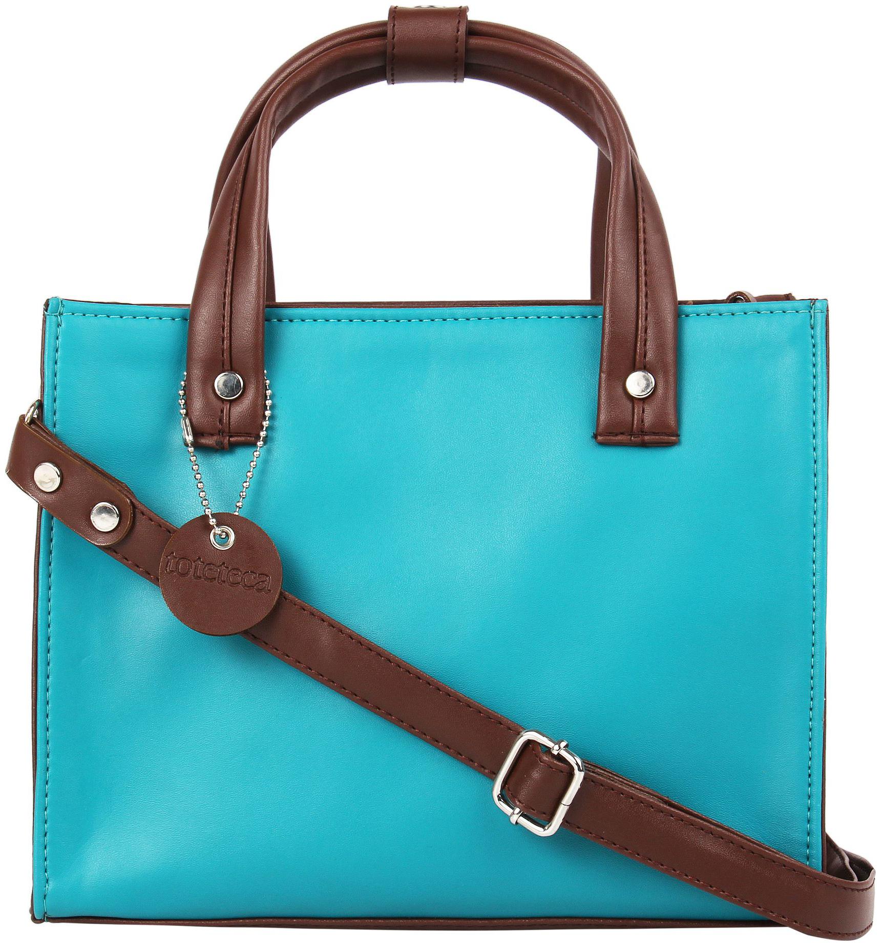 

Toteteca Bag Works Blue Faux Leather Handheld Bag
