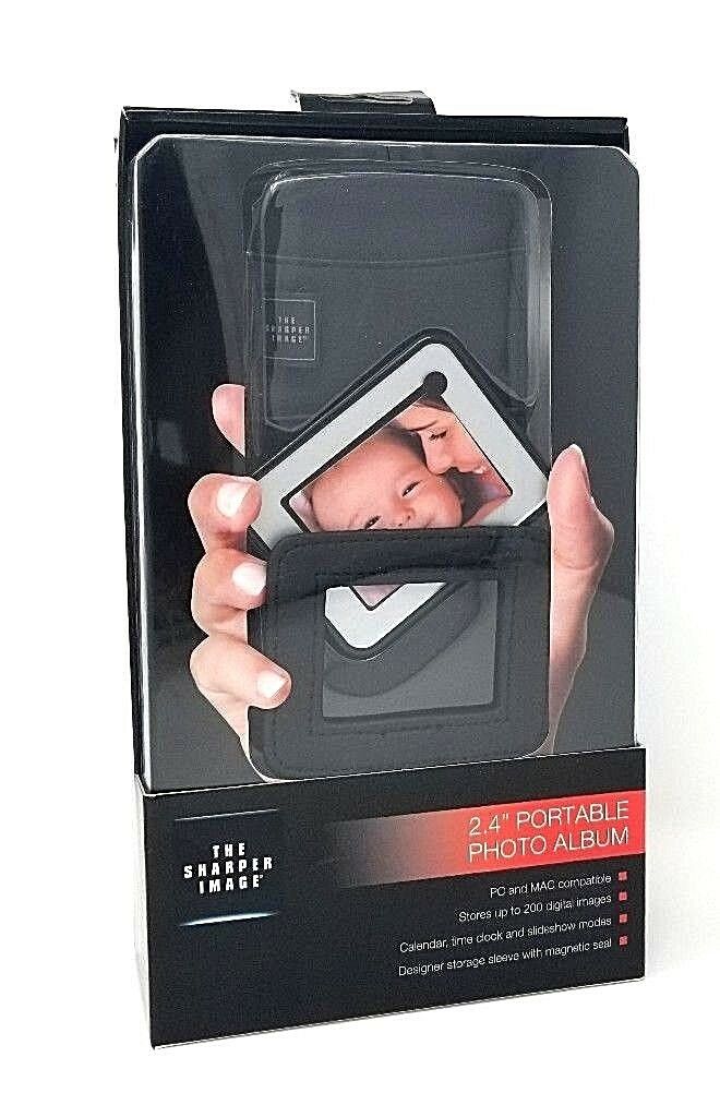 

THE SHARPER IMAGE 2 4 PORTABLE PHOTO ALBUM STORES 200 DIGITAL IMAGES PC MAC COM