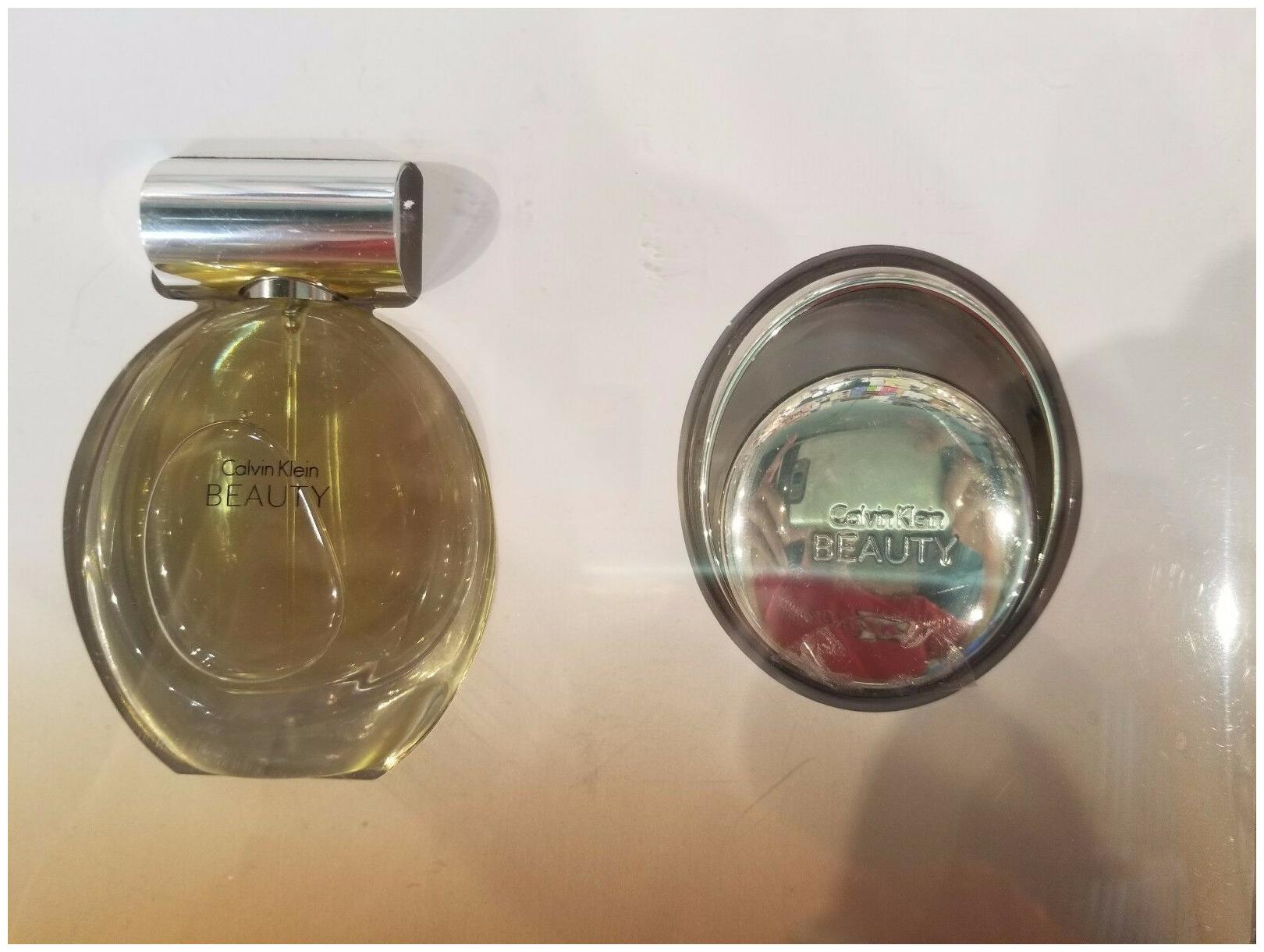 

Calvin Klein CK Beauty 2 pc EDP GIFT SET EDP Spray Solid Perfume Purse Charm