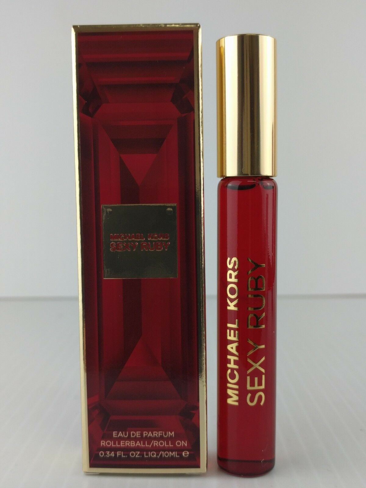 

MICHAEL KORS SEXY RUBY PURSE SIZE 10 ML NEW ROLLER BALL NEW IN BOX